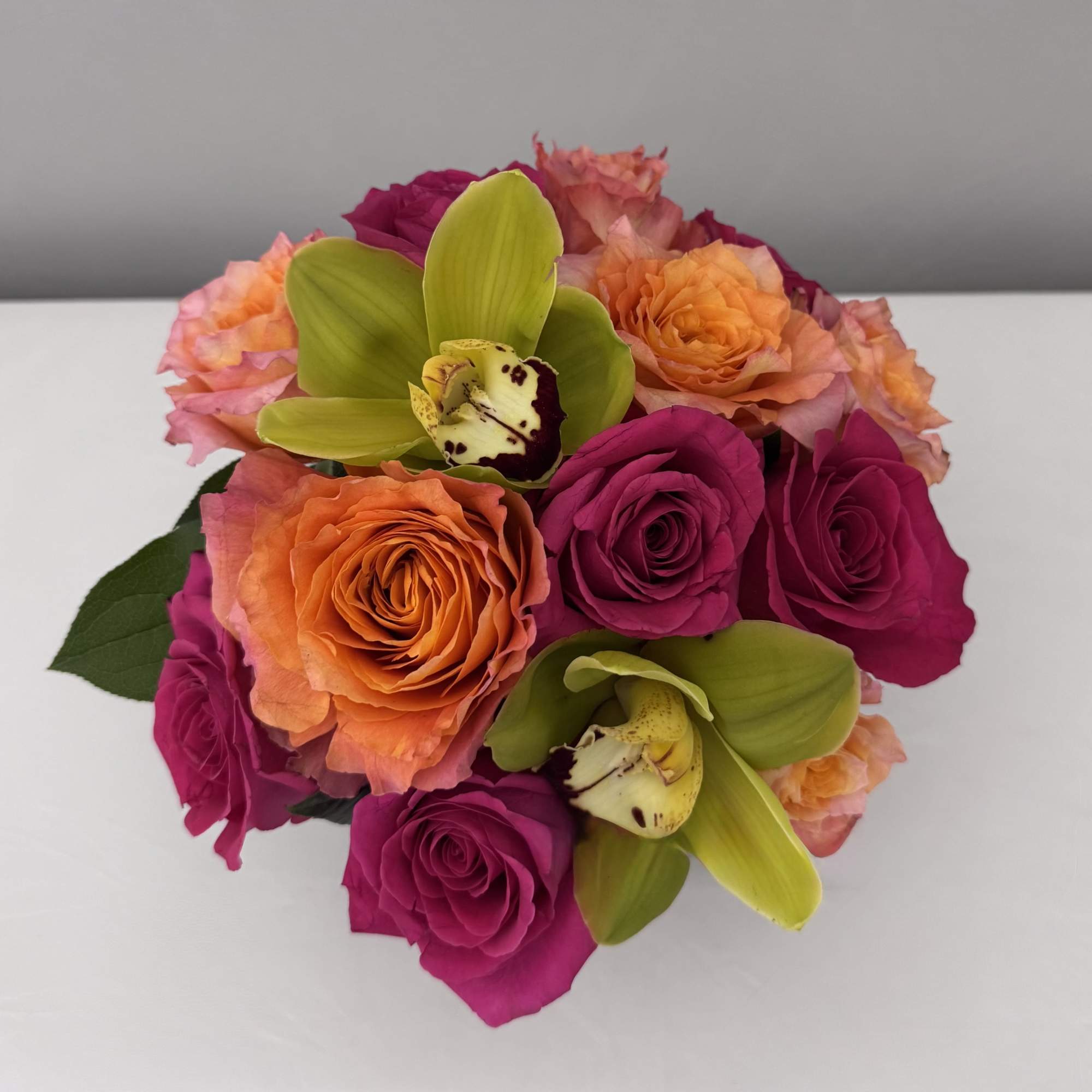 A VIBRANT MIXTURE OF HOT PINK FLOYD & ORANGE FREE SPIRIT ROSES A VIBRANT MIXTURE OF HOT PINK FLOYD & ORANGE FREE SPIRIT ROSES