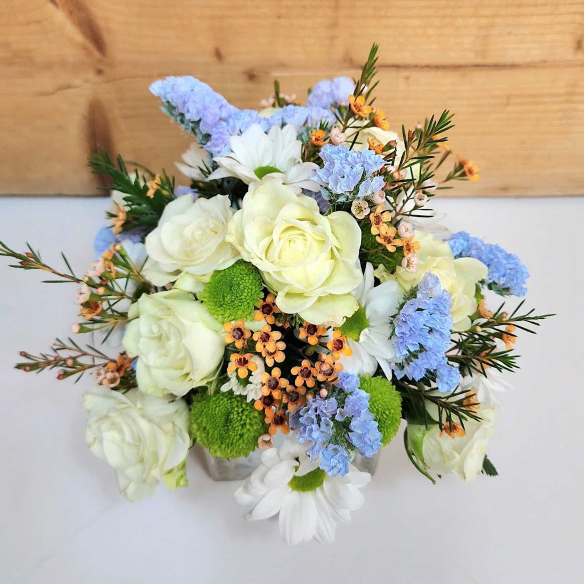 Celebrate the arrival of a sweet baby boy with this charming arrangement