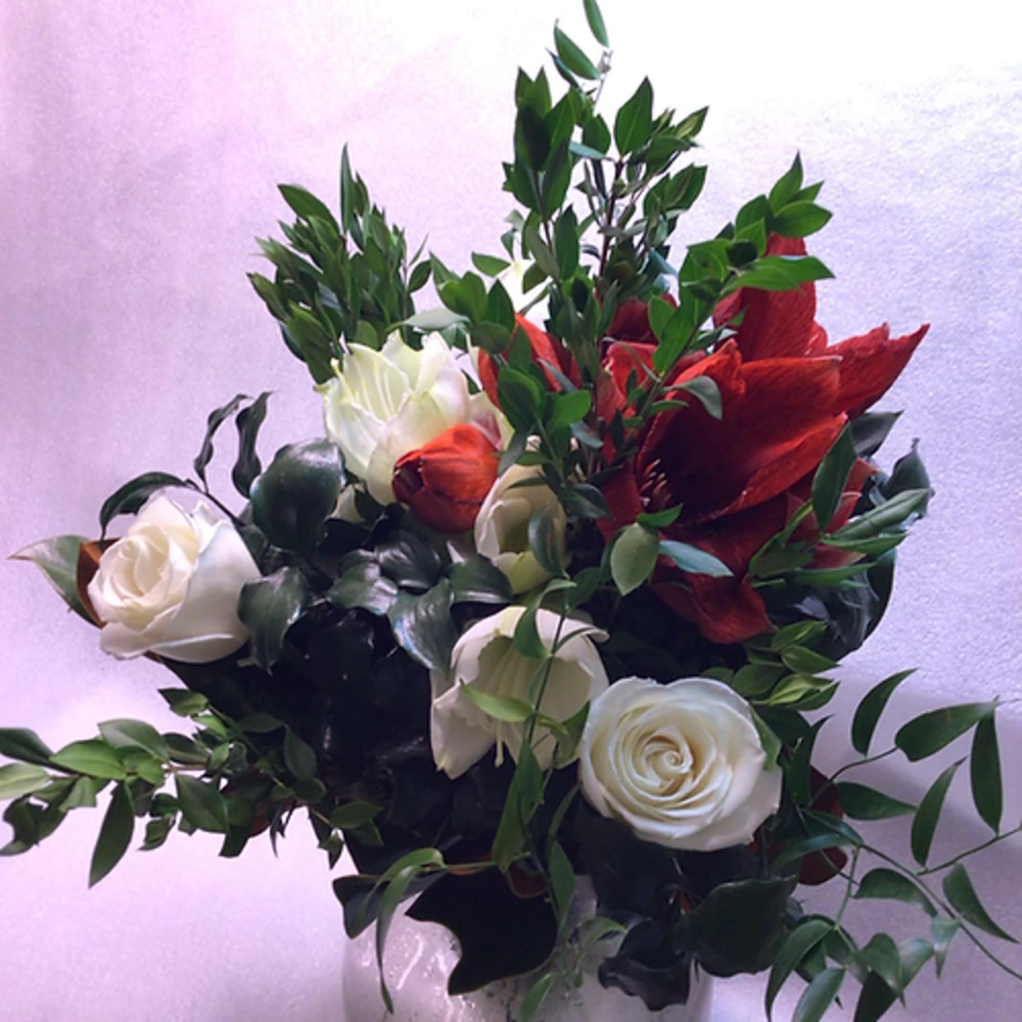 A variety of long-lasting seasonal amaryllis flowers with roses, fragrant greens and