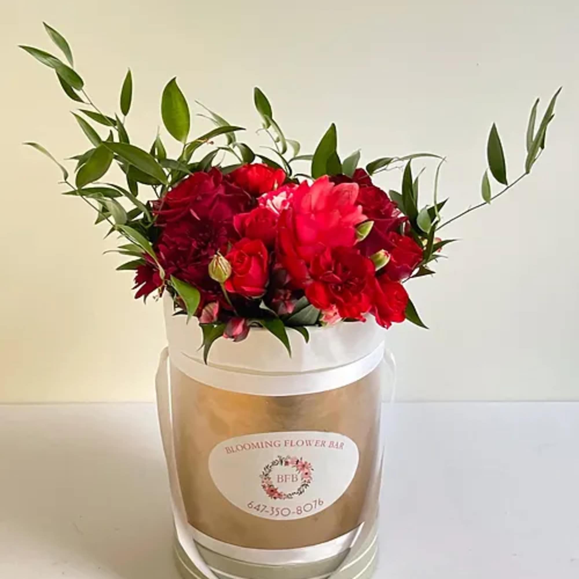 Available in pink, red, or white.  Our gorgeous hat box bursting