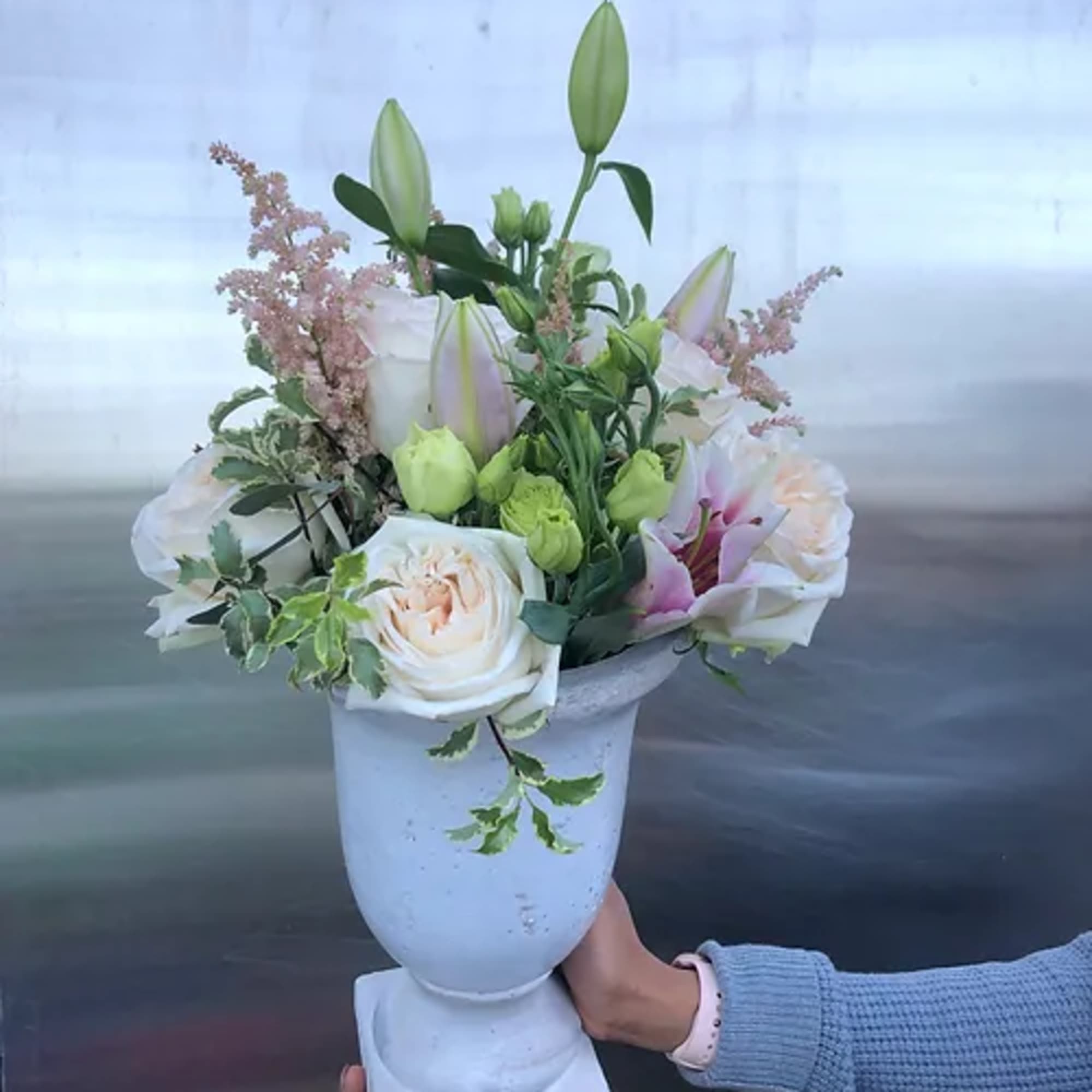 A an overflowing bouquet of local and seasonal blooms in our signature