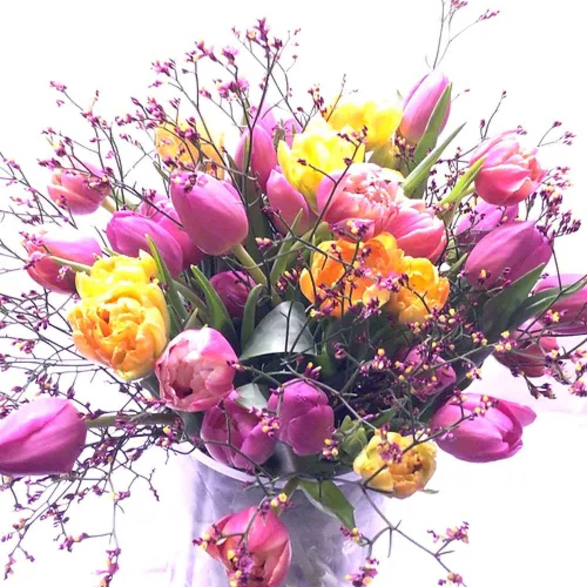 A mixture of locally grown premium novelty and classic tulips bunched with