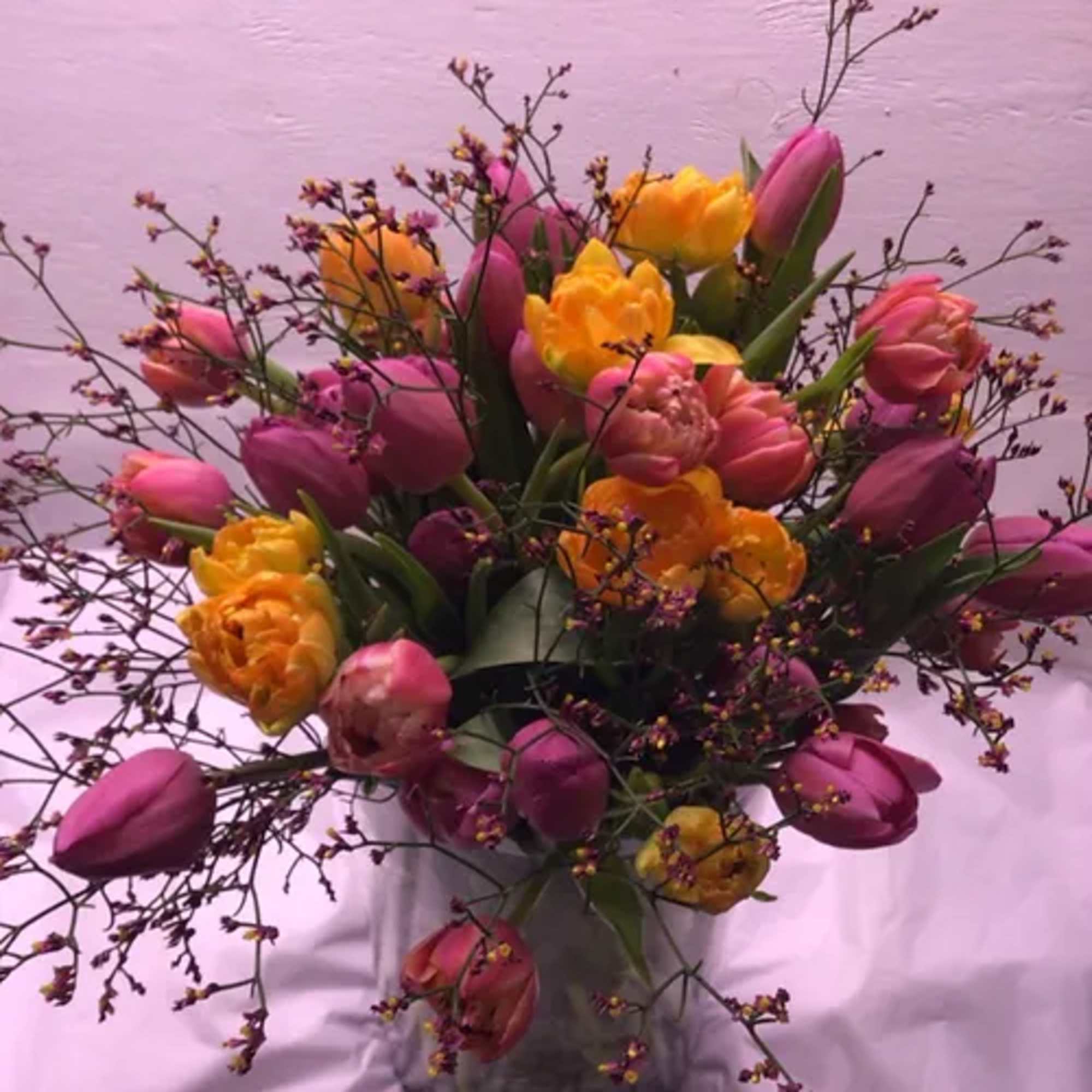 A mixture of locally grown premium novelty and classic tulips bunched with