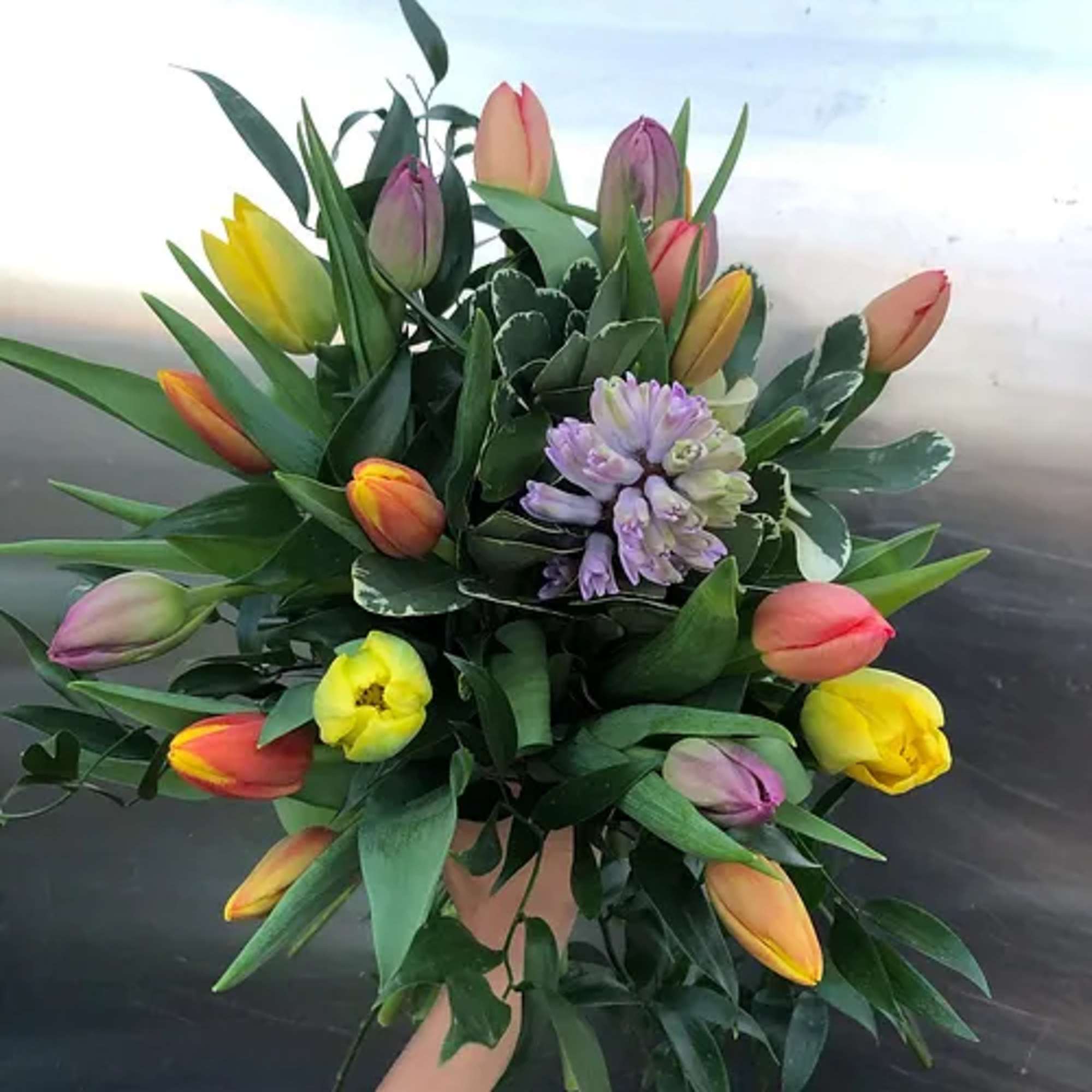 A mixture of locally grown premium novelty and classic tulips bunched with
