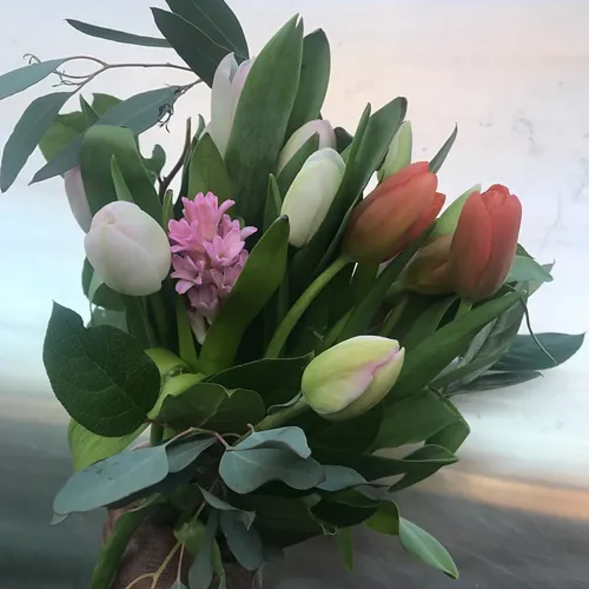 A mixture of locally grown premium novelty and classic tulips bunched with