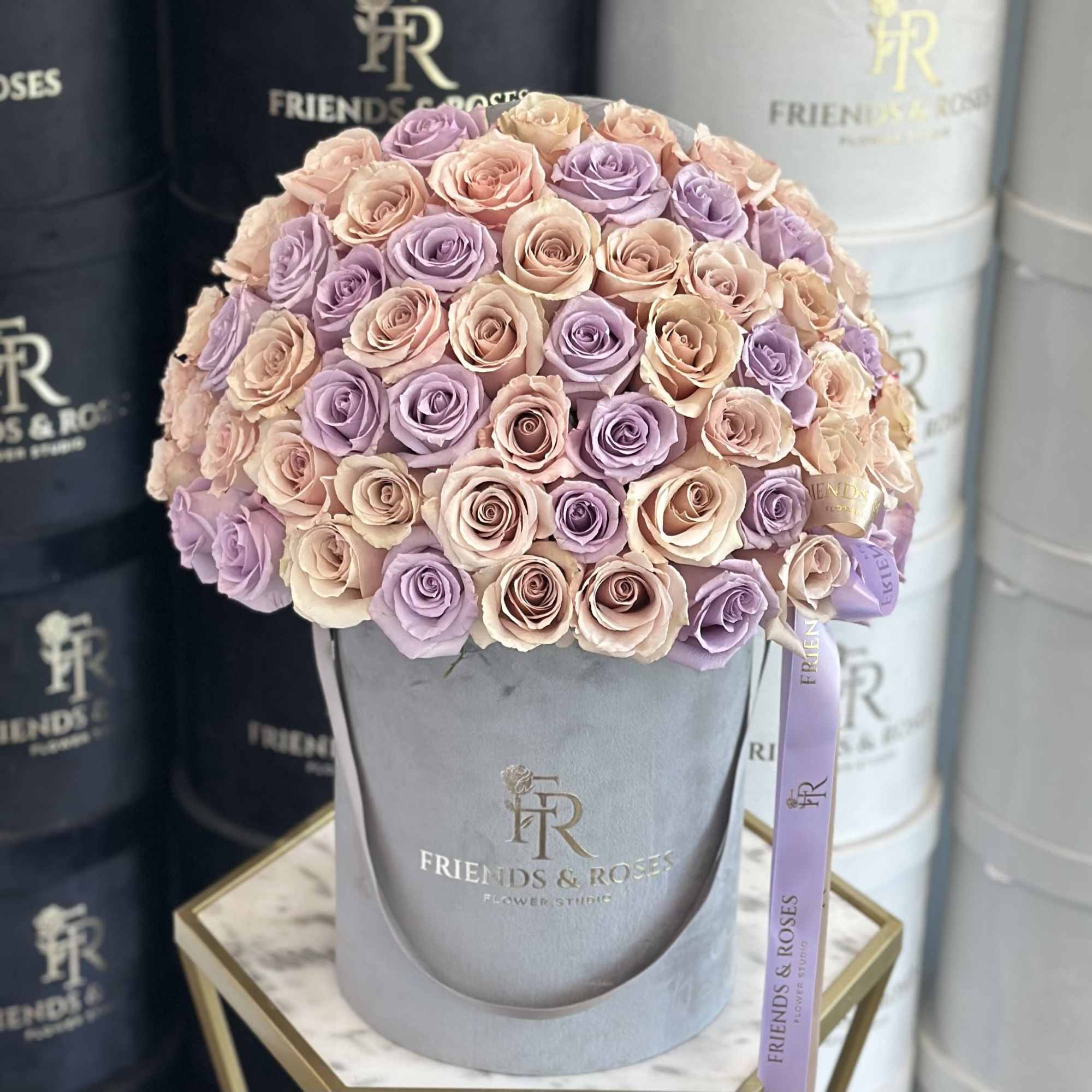 Our signature box features a stunning floral arrangement of delicate lavender and