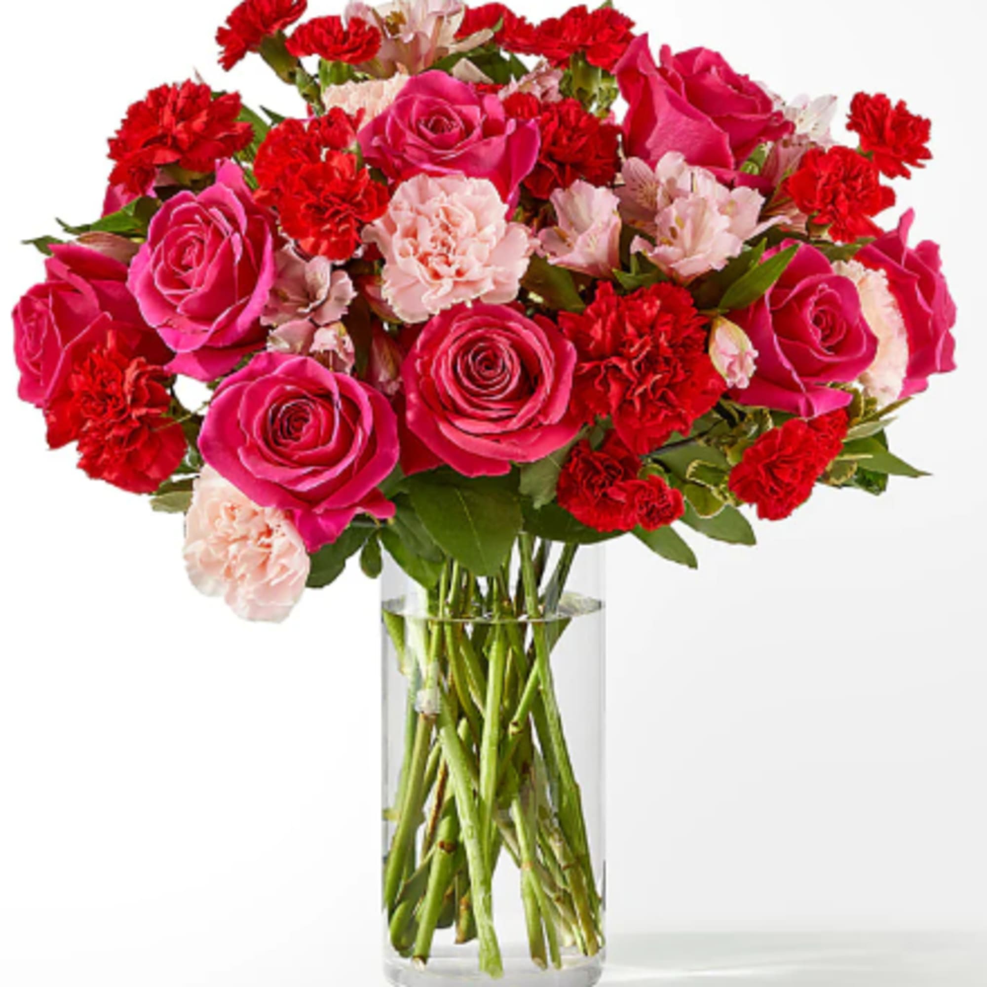 Blushing shades of pink blooms, nestled in lush greenery, are sure to