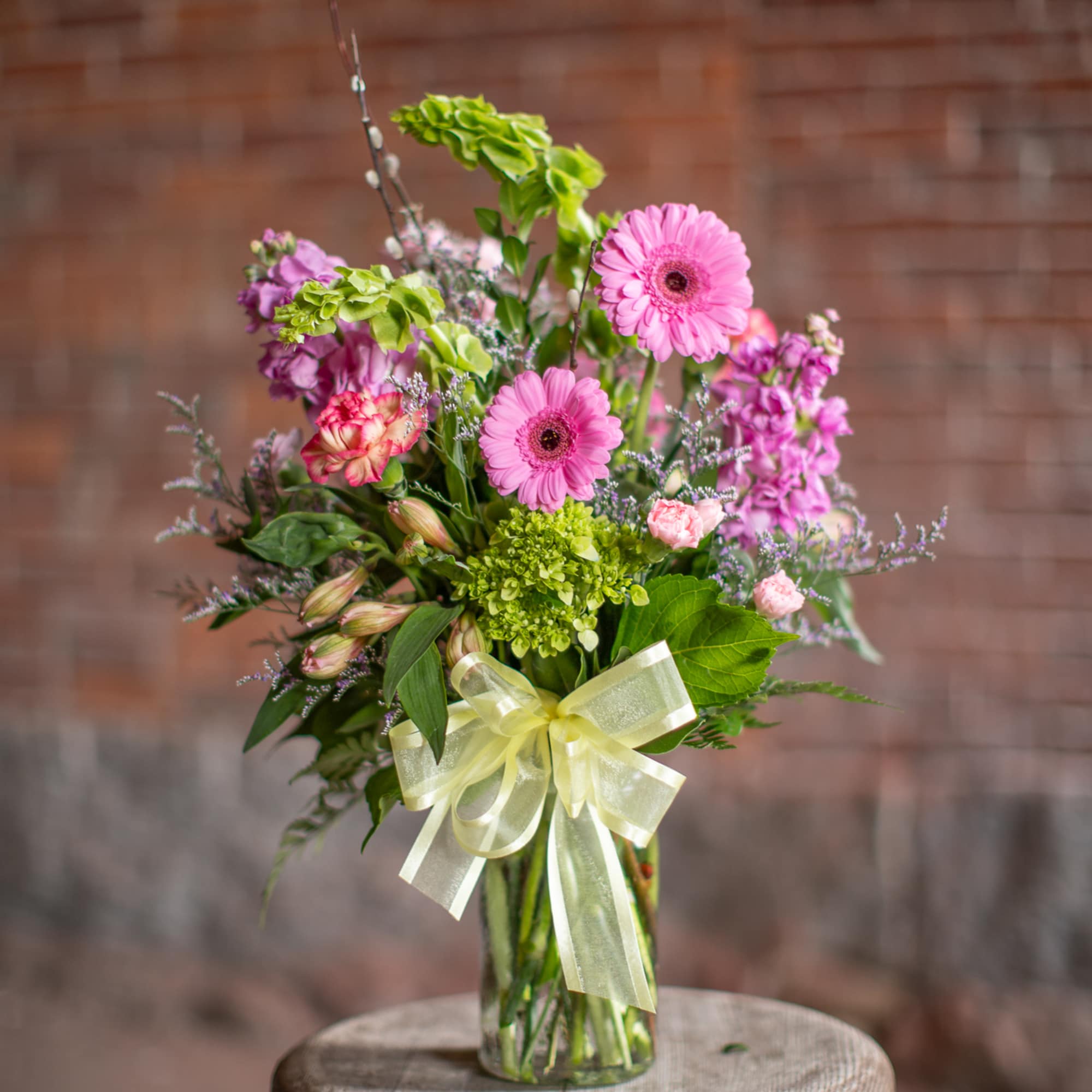A wildflower mix in a textured glass vase. This mix of standard