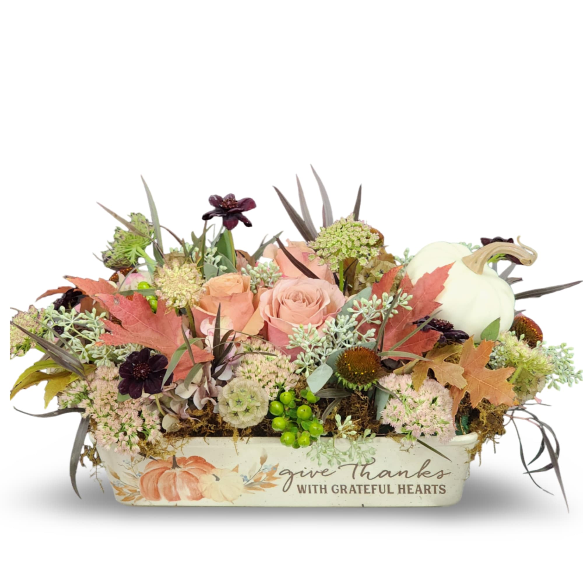 This charming centerpiece is designed in a rustic casserole dish that reads