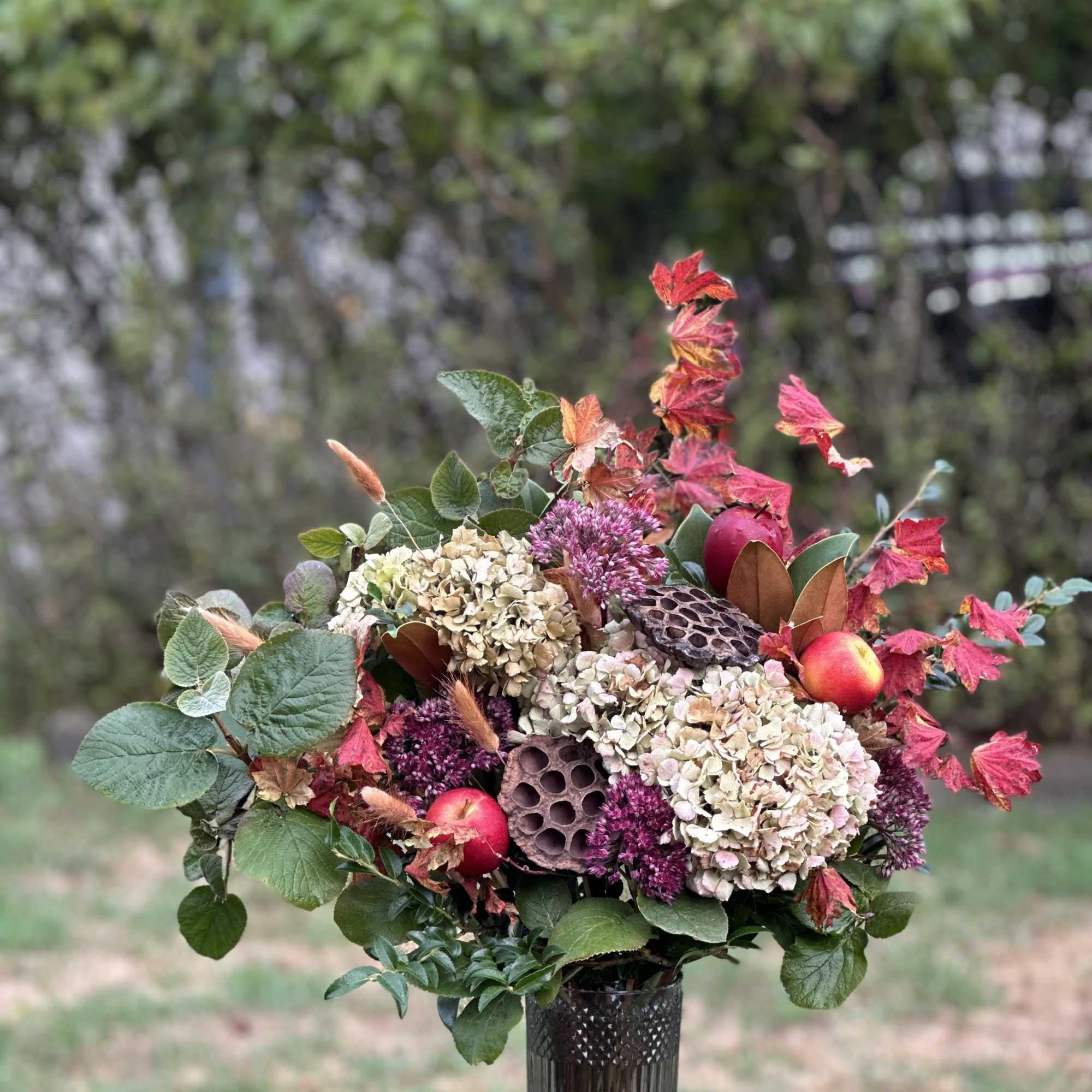 A Grand Foliage and Texture-Driven Bespoke arrangement Designed with Foraged Greens, and