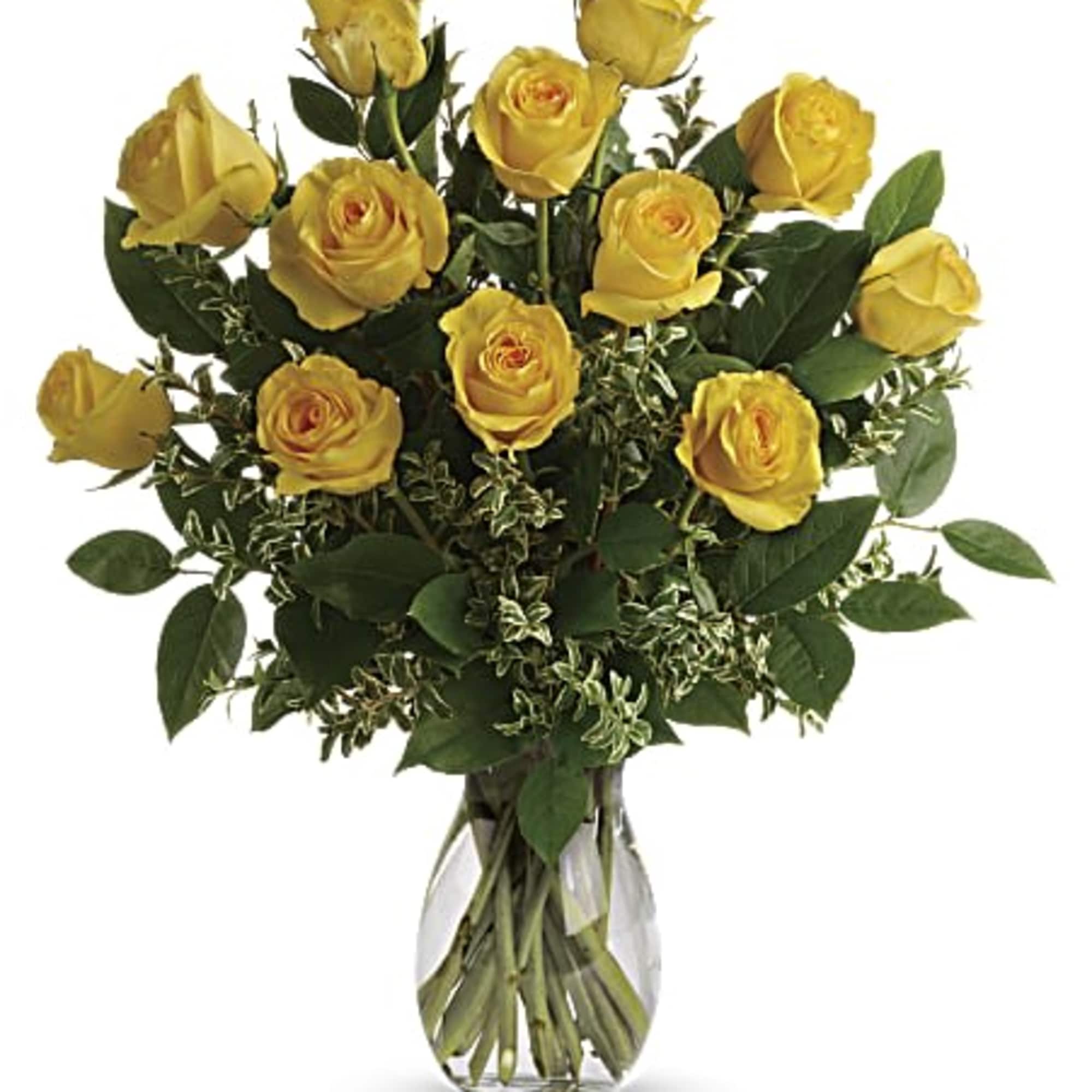 This gorgeous floral arrangement is a radiant display of sunshine and happiness
