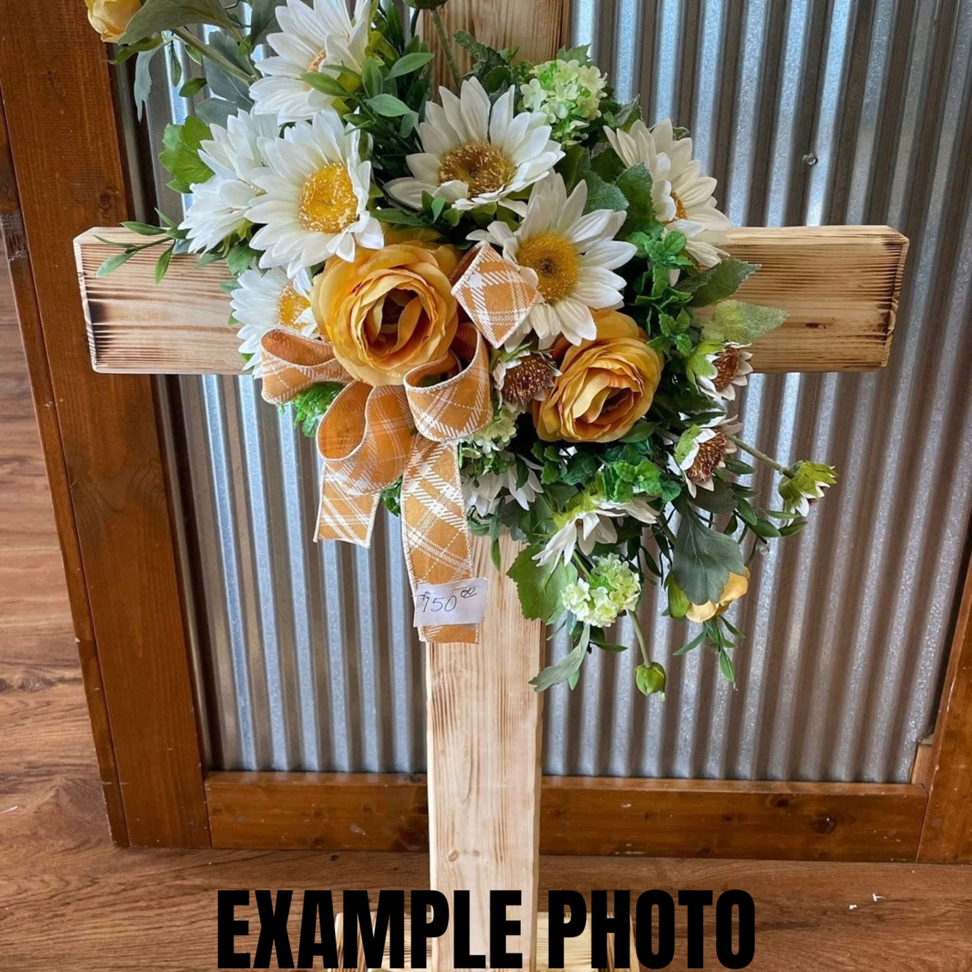 A beautiful wooden distressed cross! These can have fresh or silk flowers