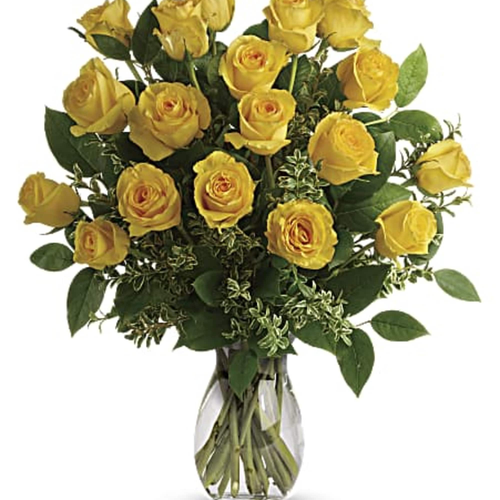 This gorgeous floral arrangement is a radiant display of sunshine and happiness