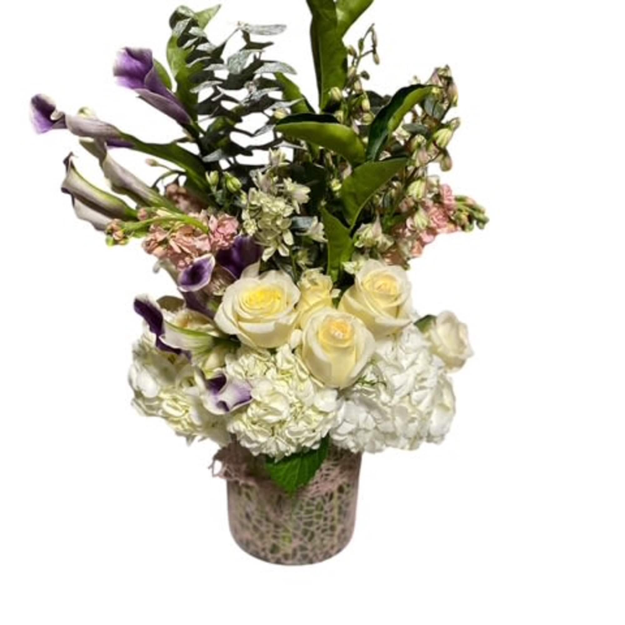 This angelic arrangement is as cute as it is pretty. Featuring the