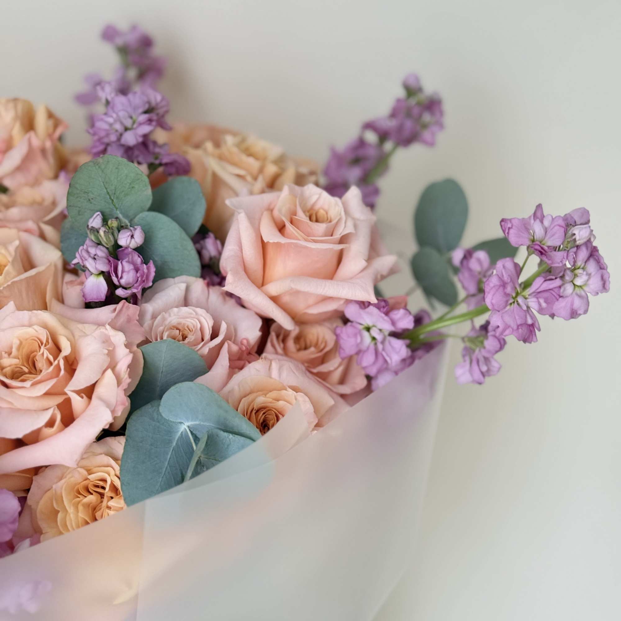 A soft blend of blush roses and lavender delicate, elegant, and full