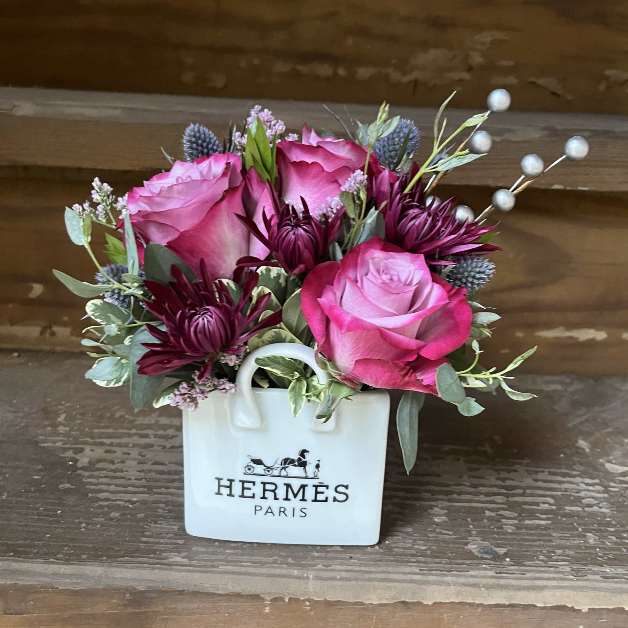 Choose your Bag at checkout and we will add seasonal blooms. 