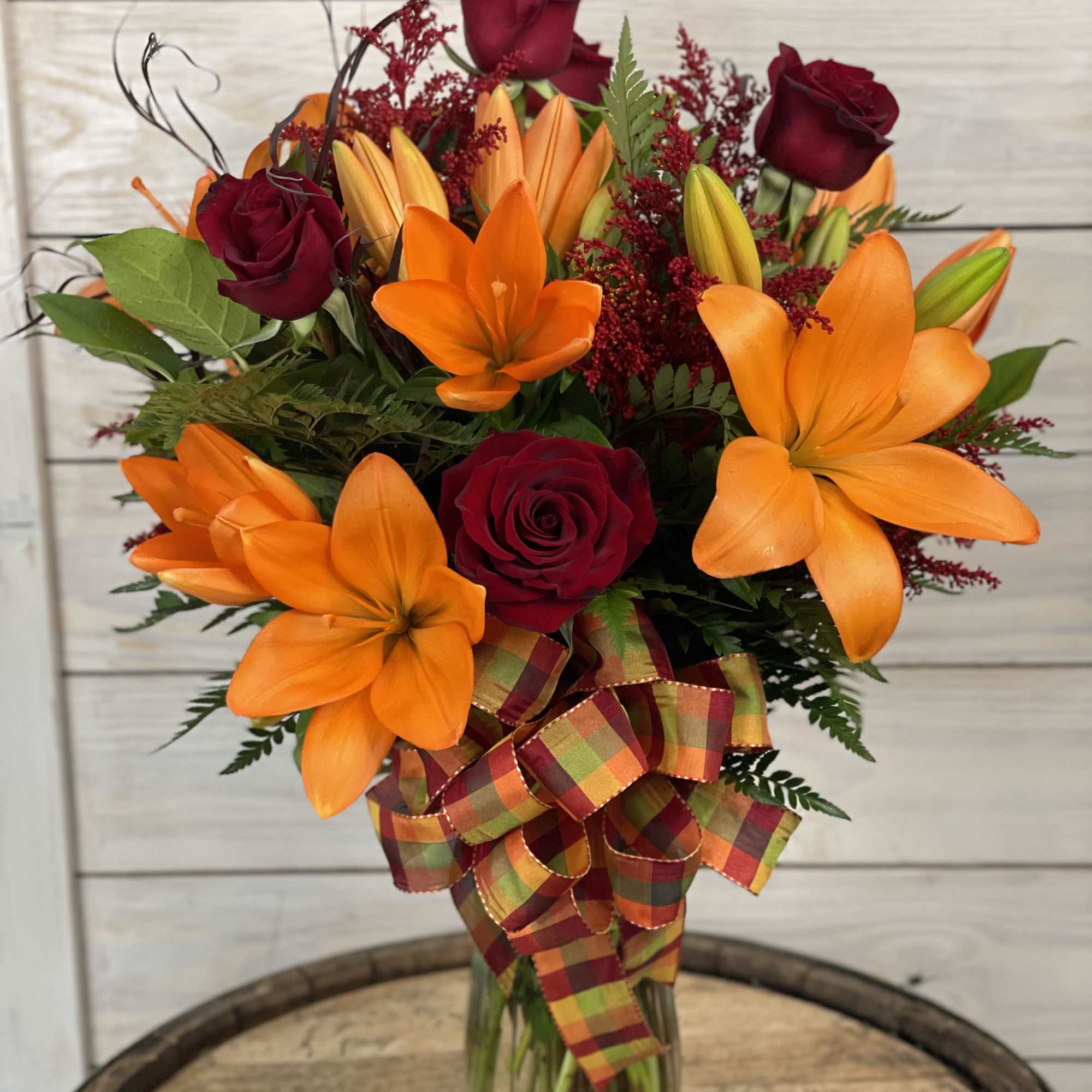 Outstanding and stunning! 6 lilies and 6 roses in a vase with