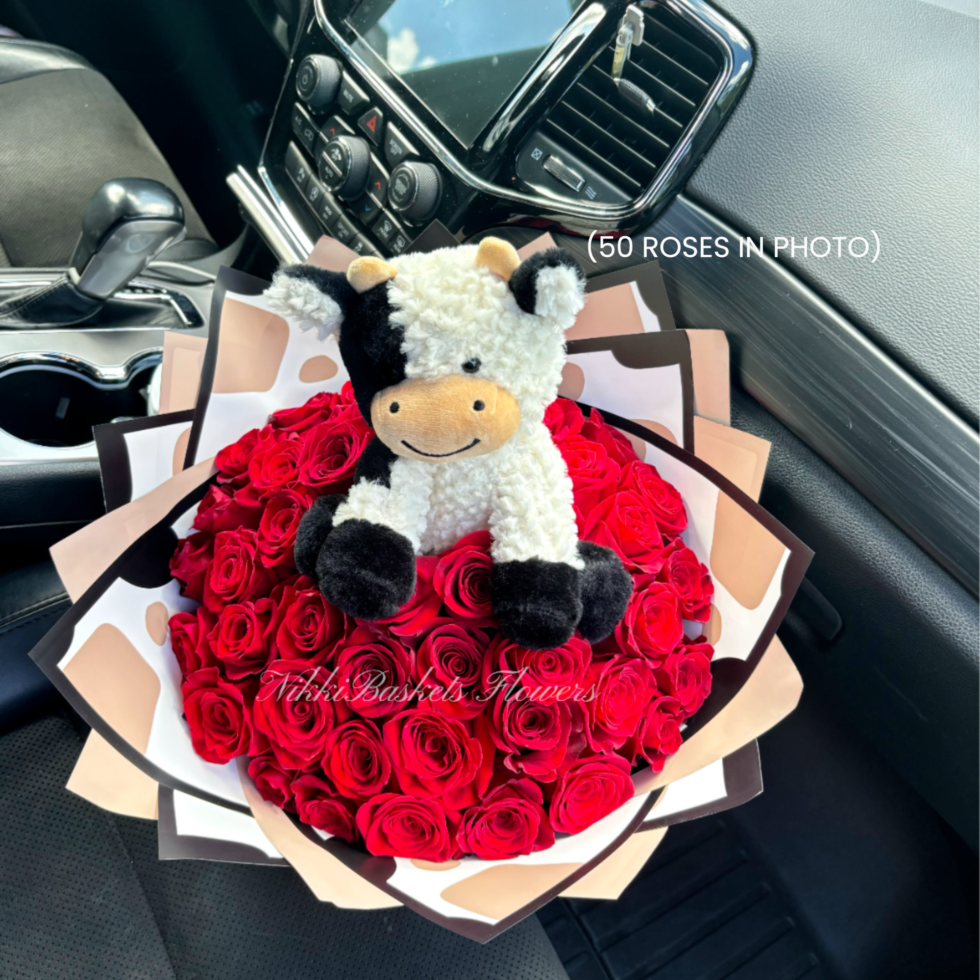 Rose bouquet with cow plushie