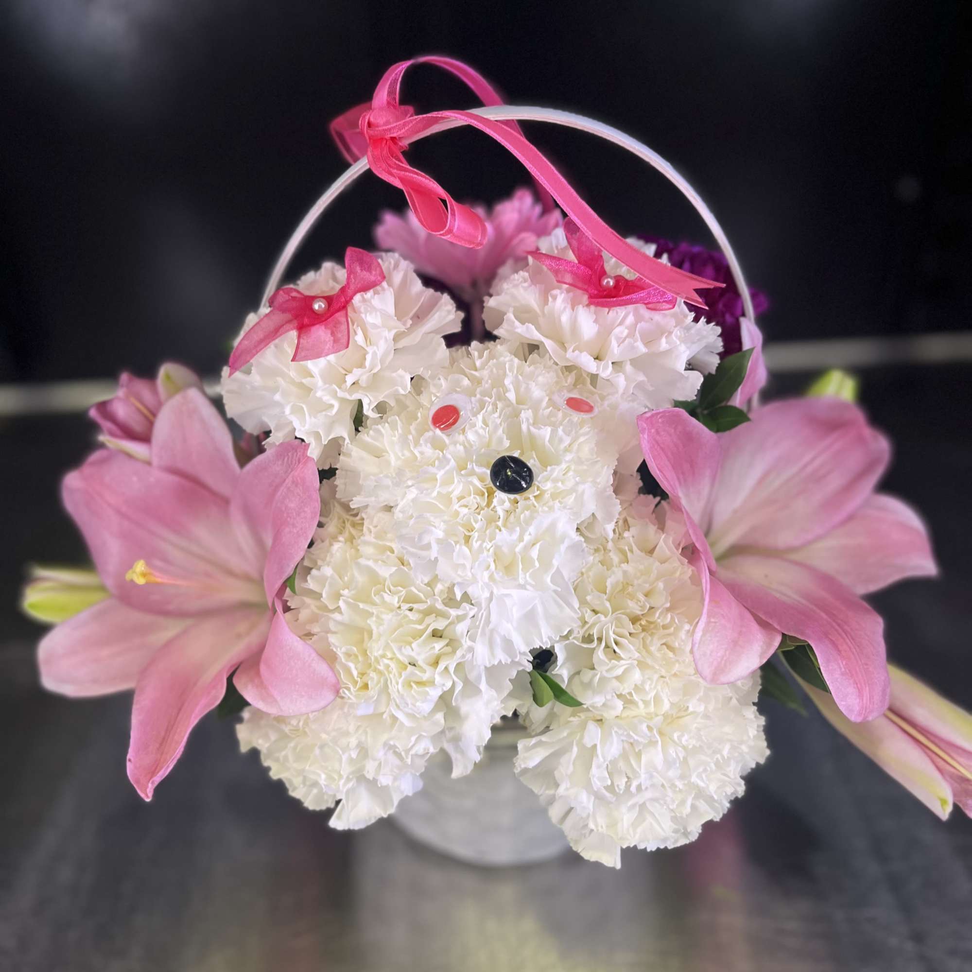 Flower shape dog in basket with flowers 
