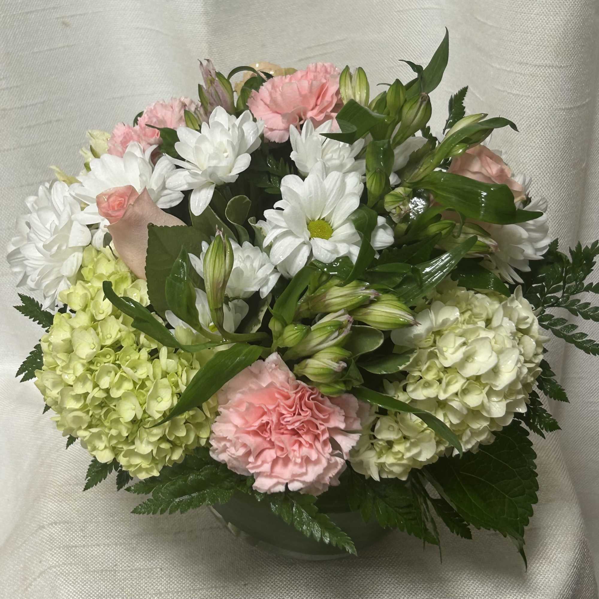 Sometimes simple is better! Soft toned florals arranged in a modern style