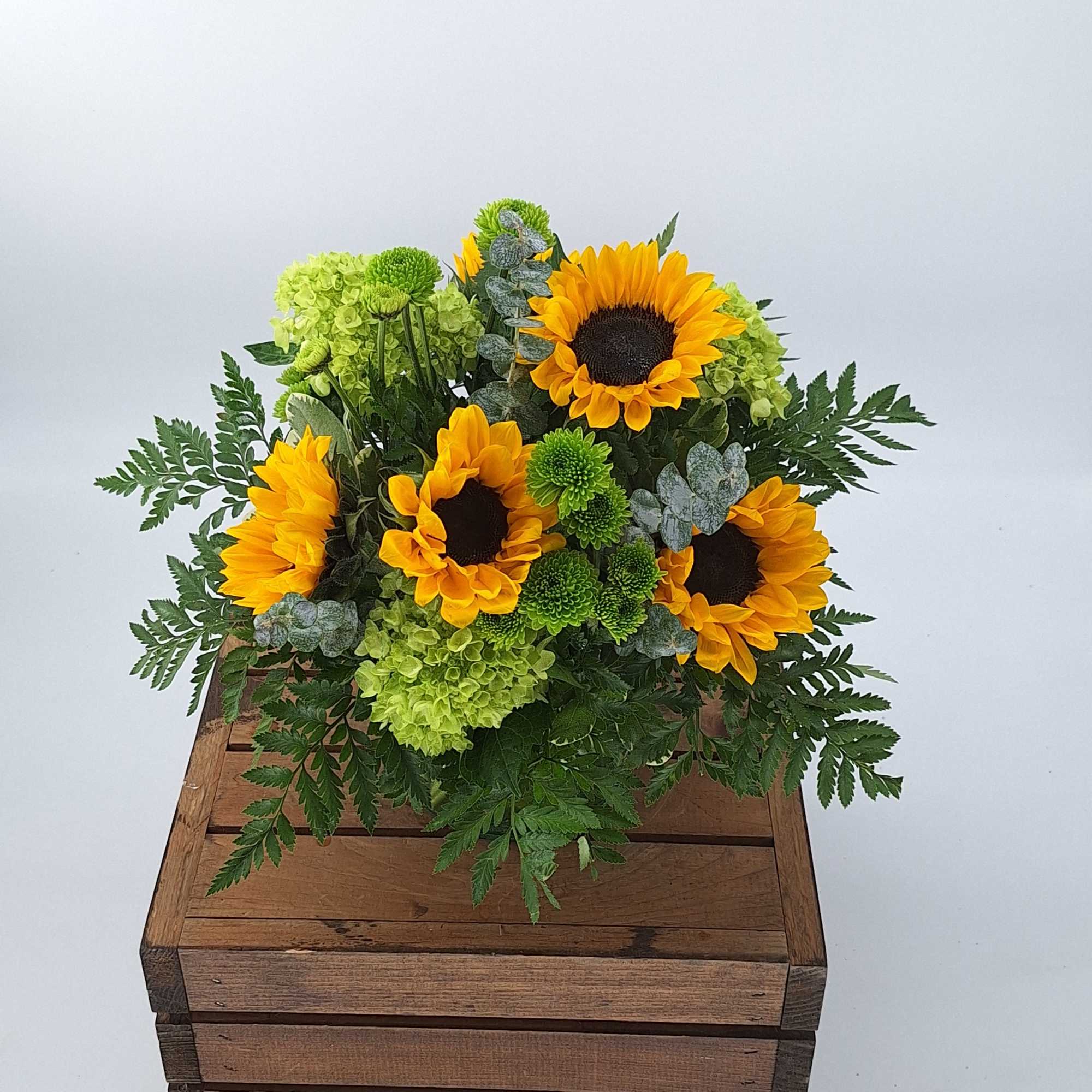 Introducing the Radiant Sunshine flower arrangement, a stunning display of vibrant beauty