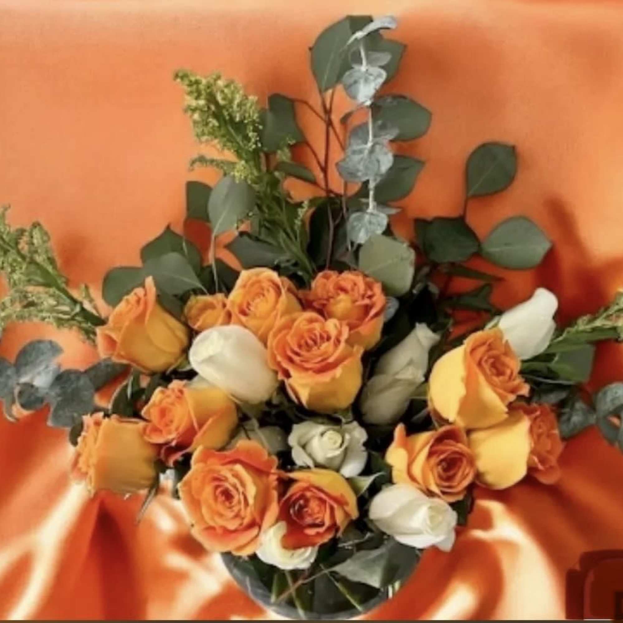 Bright, bold, and full of joy &mdash; this rose arrangement is designed