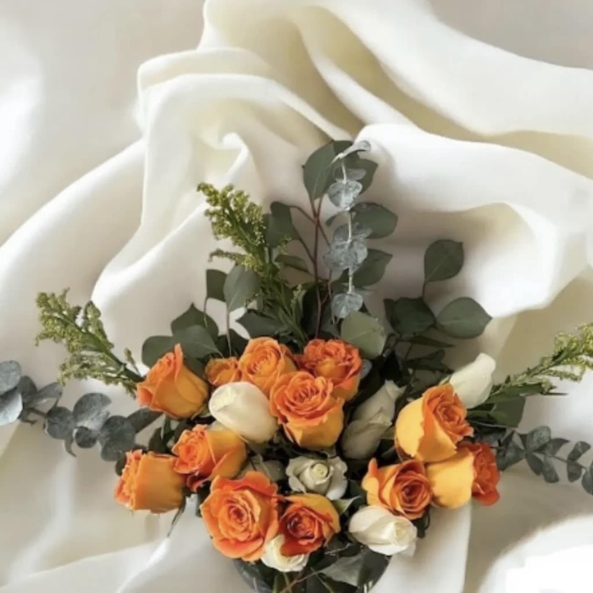 Bright, bold, and full of joy &mdash; this rose arrangement is designed