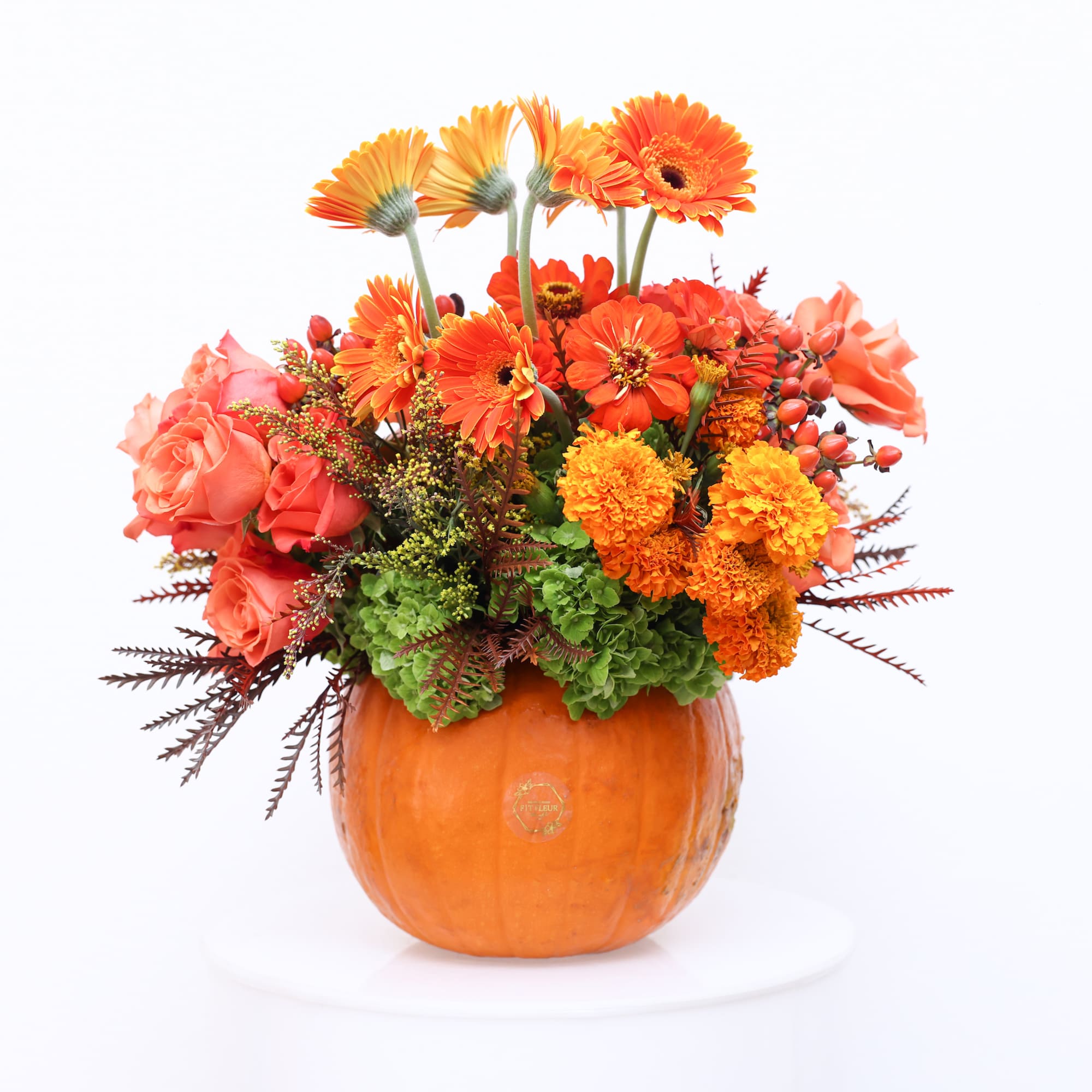 Autumn flowers are stunning in a pumkin just from the patch. What