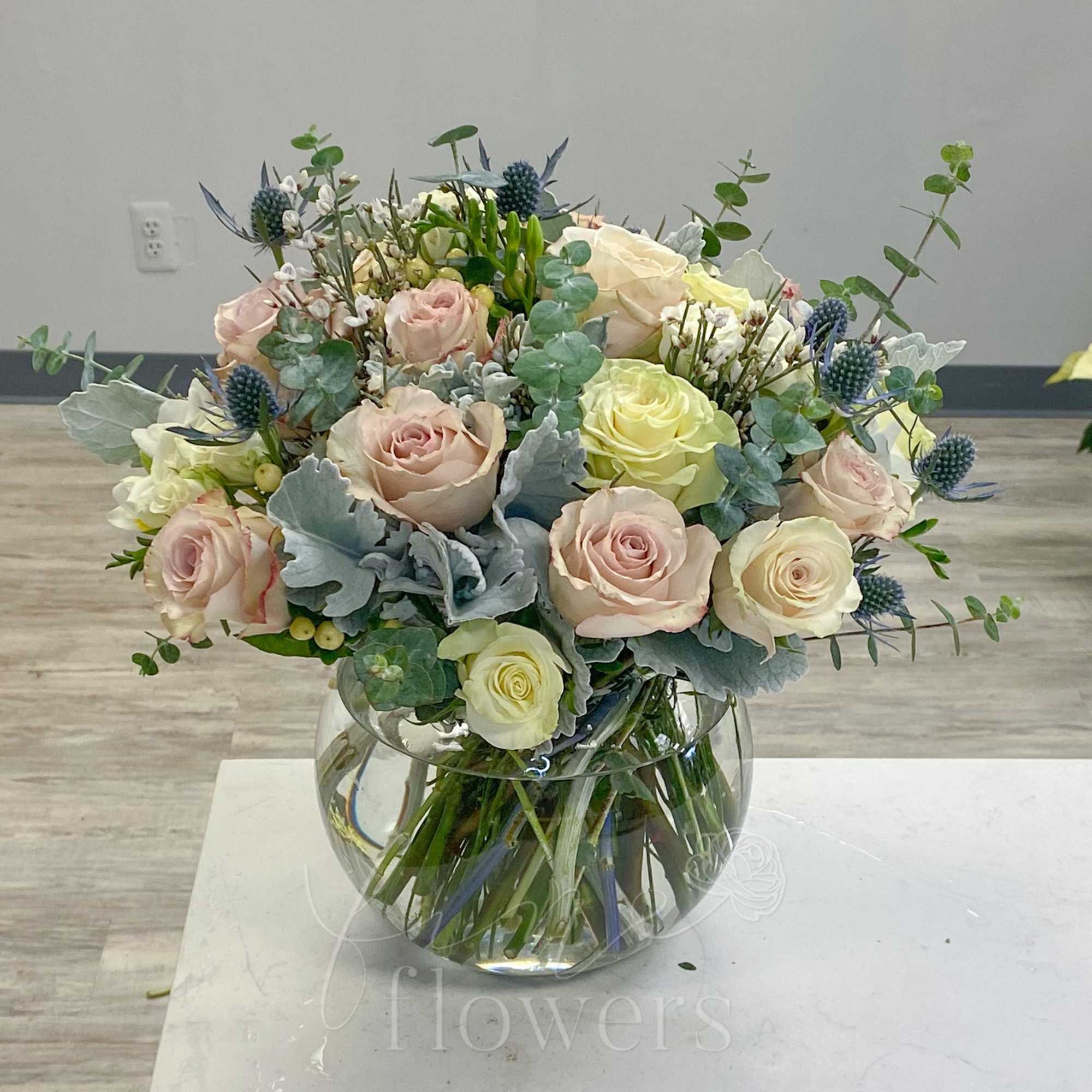 Swiss Alps is a luxurious display of neutral and blush toned Roses