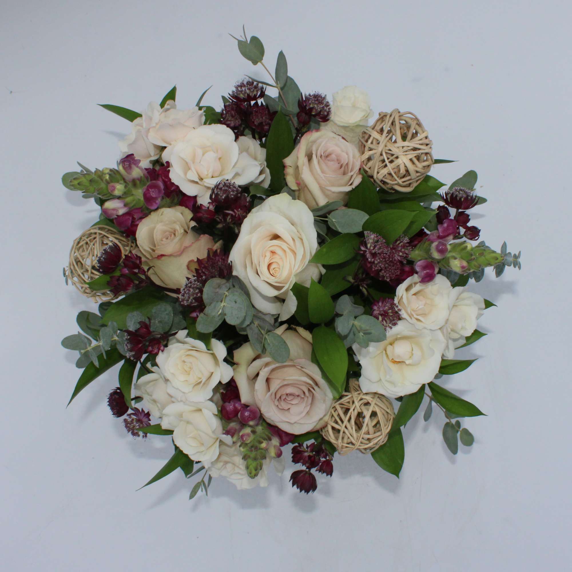 Toscana a gorgeous burgundy, ivory and nude colored fall arrangement, designed with