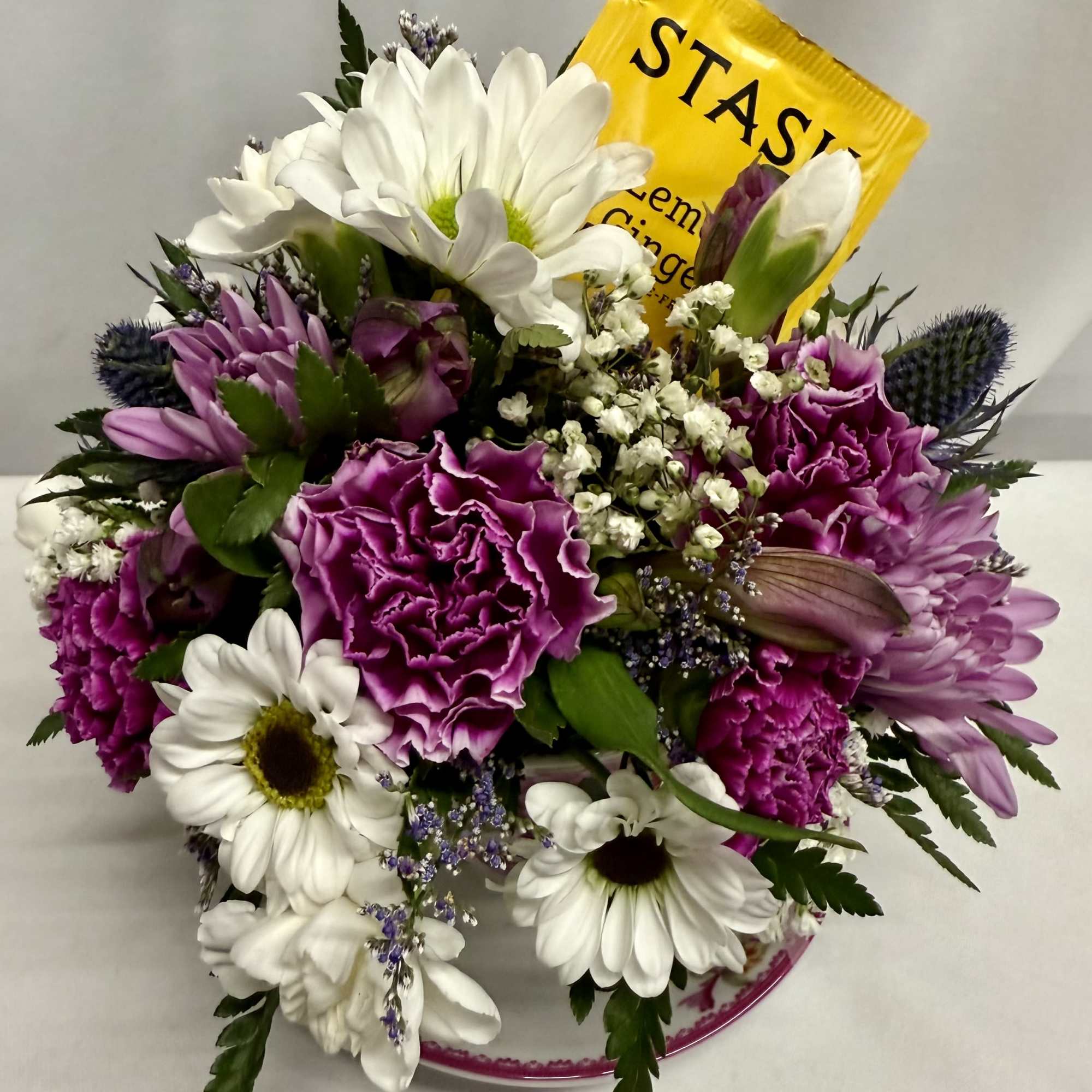 Surprise her with a Keepsake floral tea cup and saucer filled with