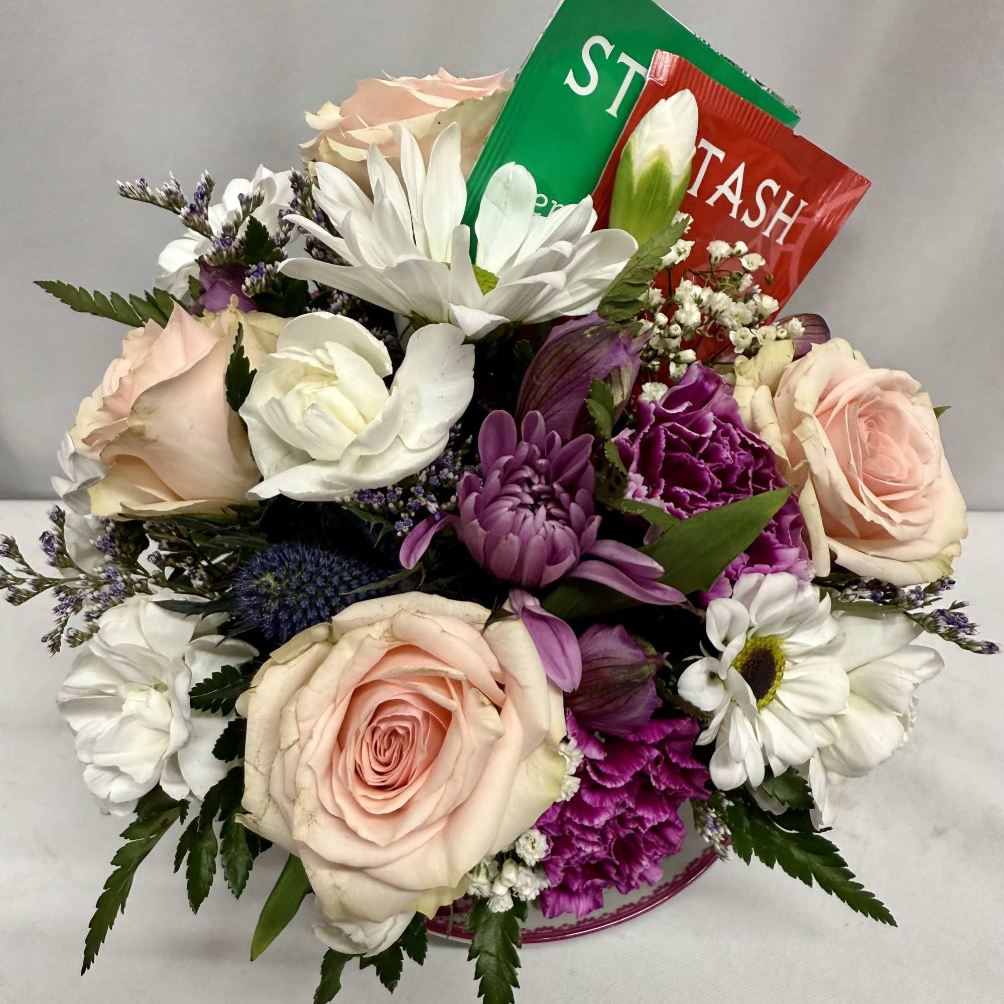 Surprise her with a Keepsake floral tea cup and saucer filled with