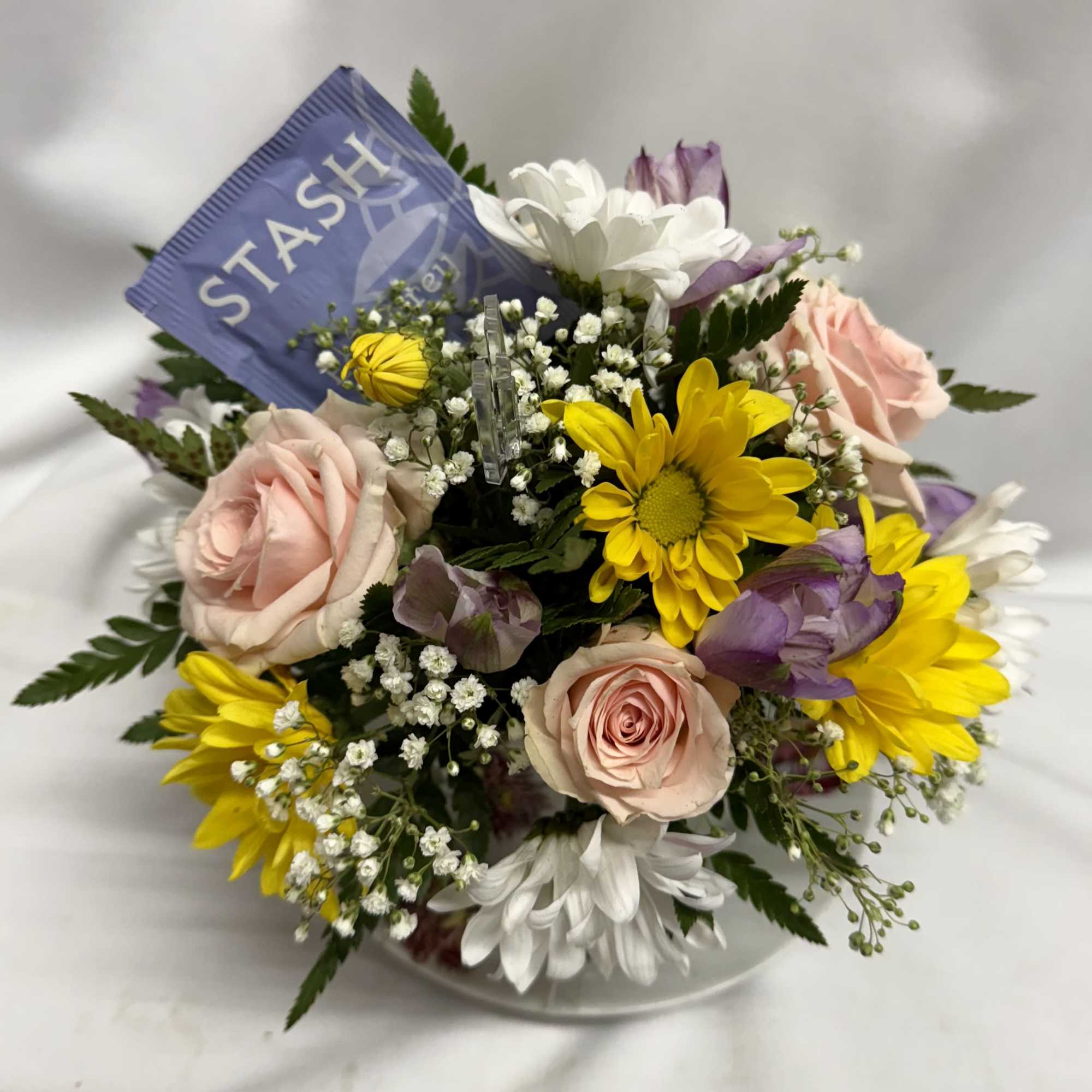 Surprise her with a Keepsake floral tea cup and saucer filled with