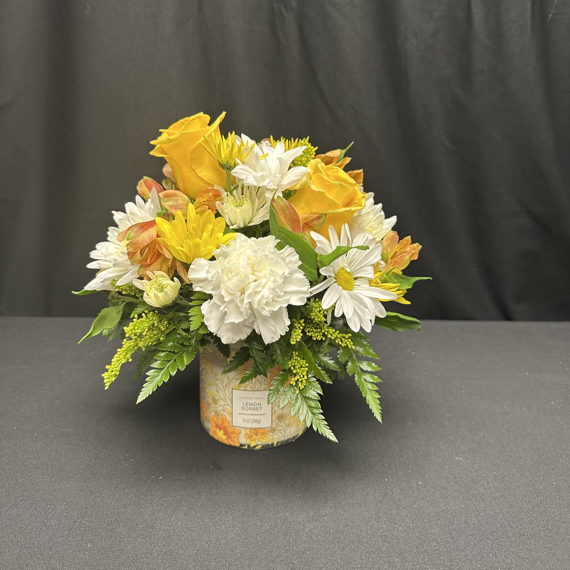 Brighten any space with this radiant pairing of fresh blooms and a
