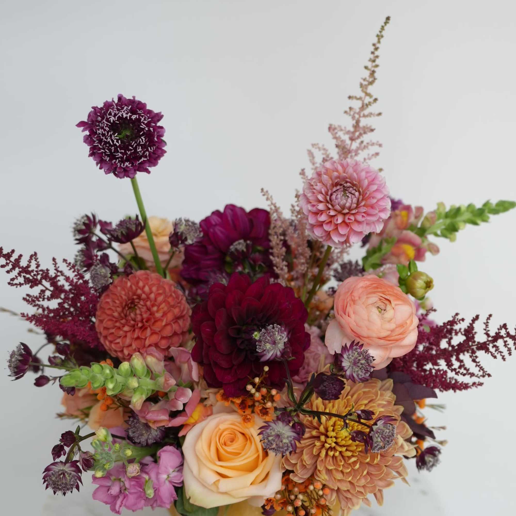 A fall favorite, crafted with warm, golden & cranberry tones and vibrant A fall favorite, crafted with warm, golden & cranberry tones and vibrant
