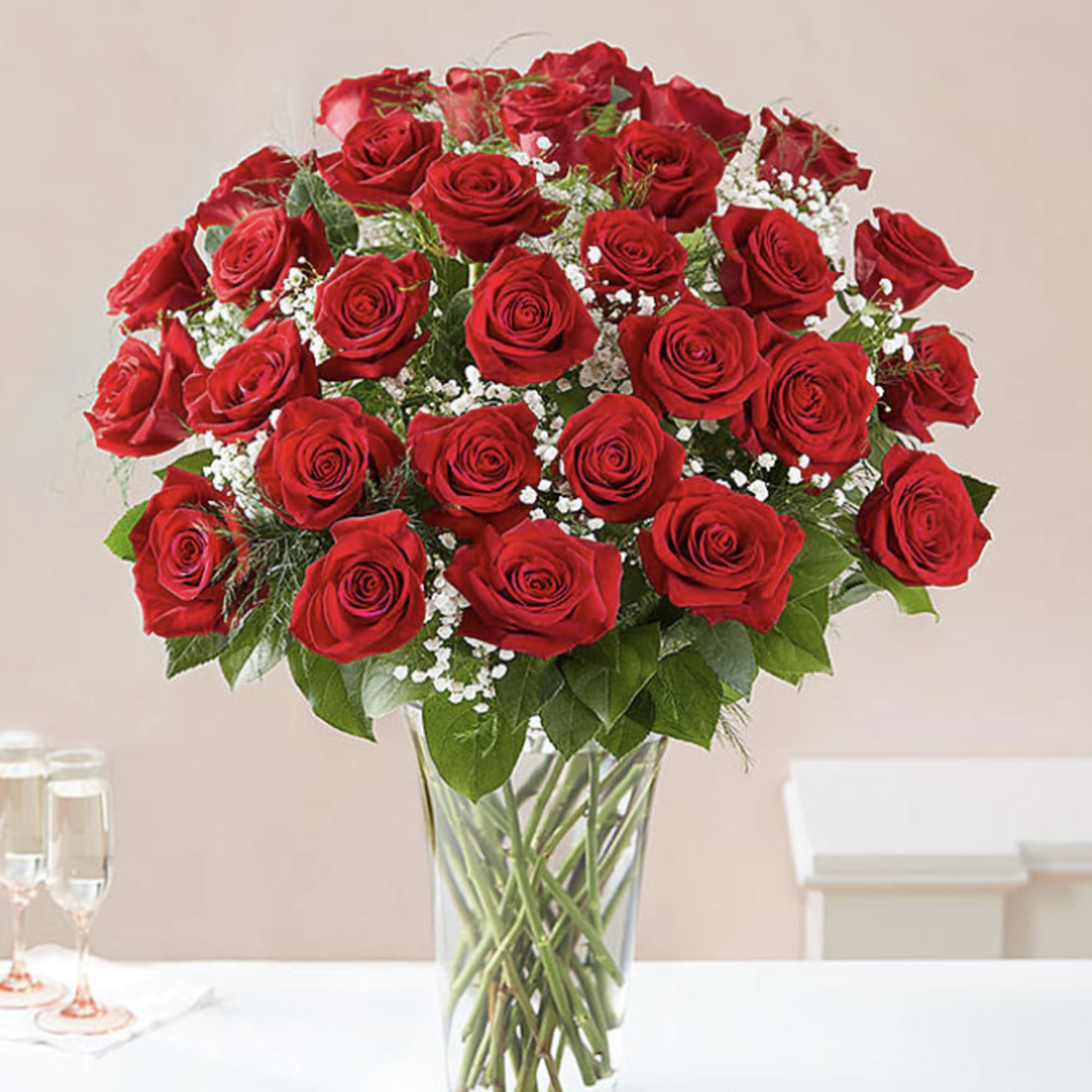 These dozen red roses are the classic symbol of love and romance These dozen red roses are the classic symbol of love and romance