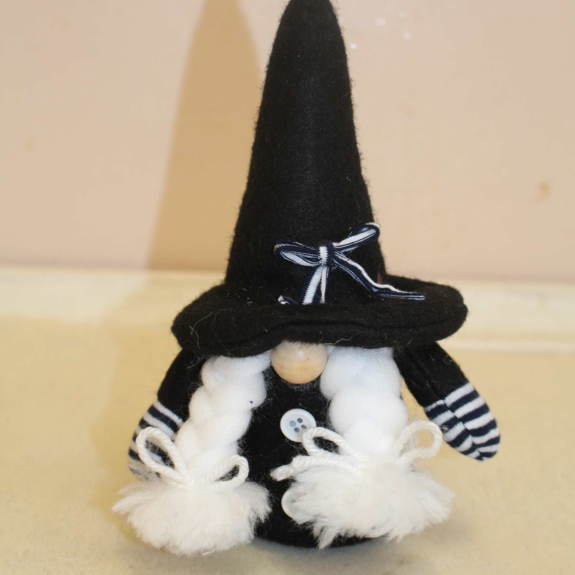 a spooky arrangement filled with a witch gnome  a spooky arrangement filled with a witch gnome