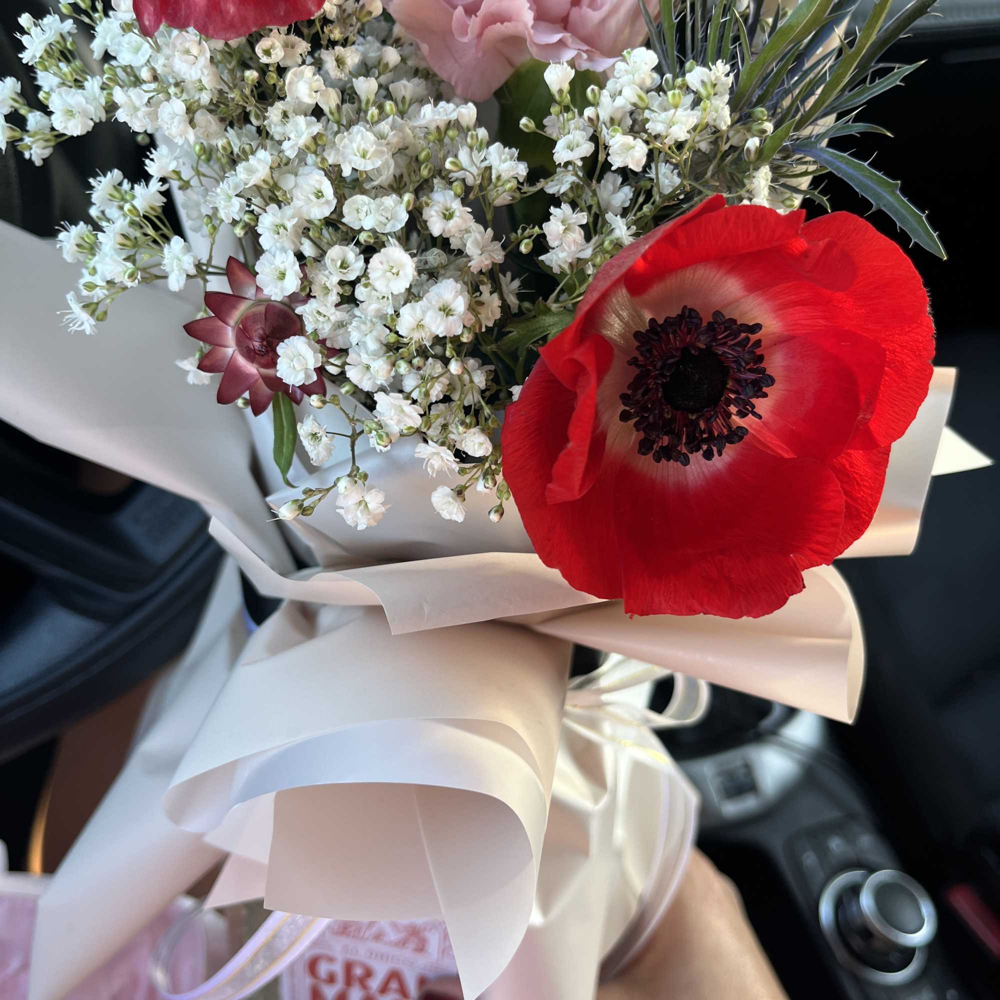 bottle not included!!! 
perfect unique floral topper to elevate a gift bottle;