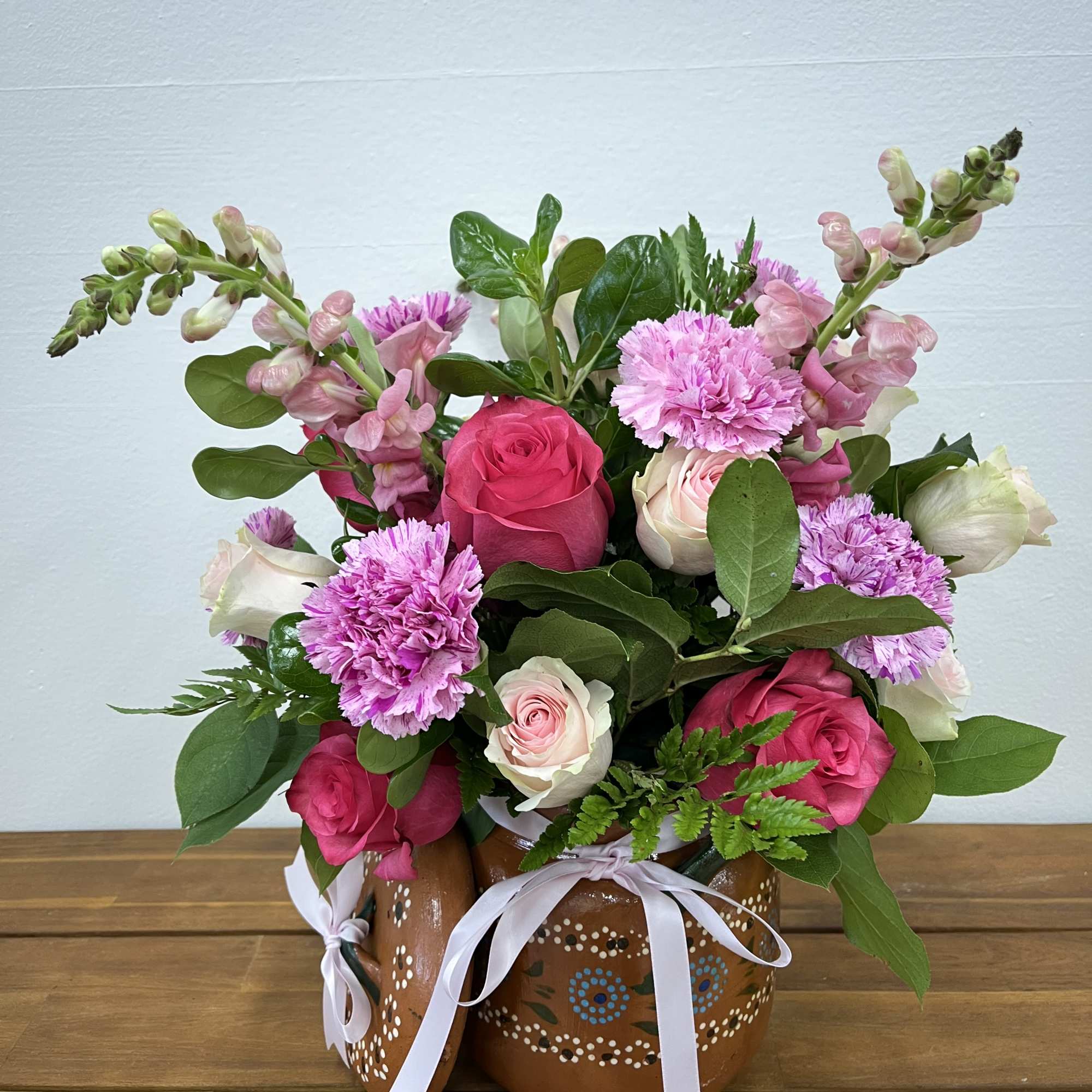 The Blooming Barro is an enchanting and elegant arrangement from our unique