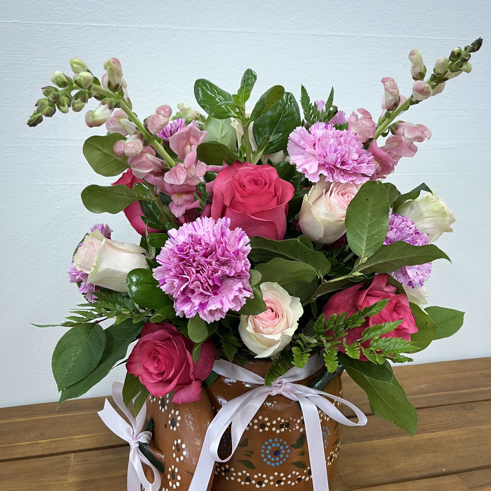 The Blooming Barro is an enchanting and elegant arrangement from our unique