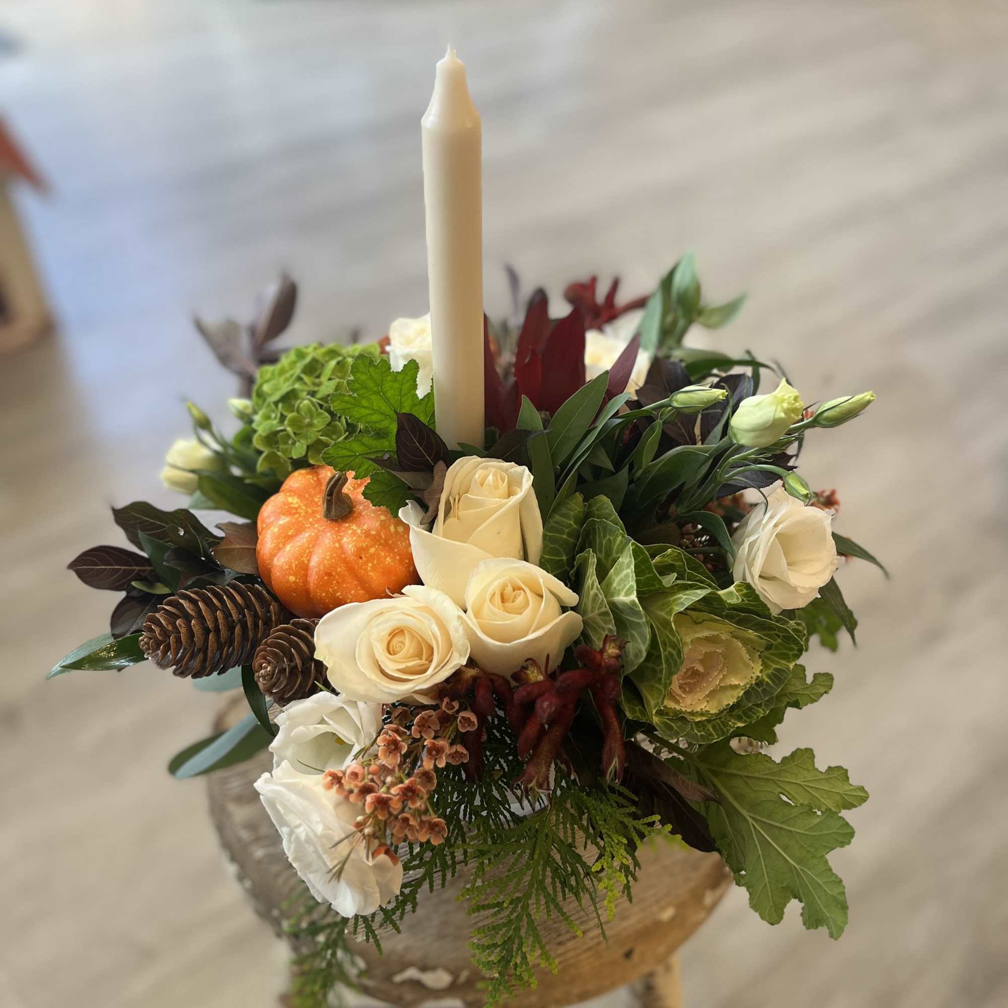 This round and full centerpiece is a wonderful addition to your holiday