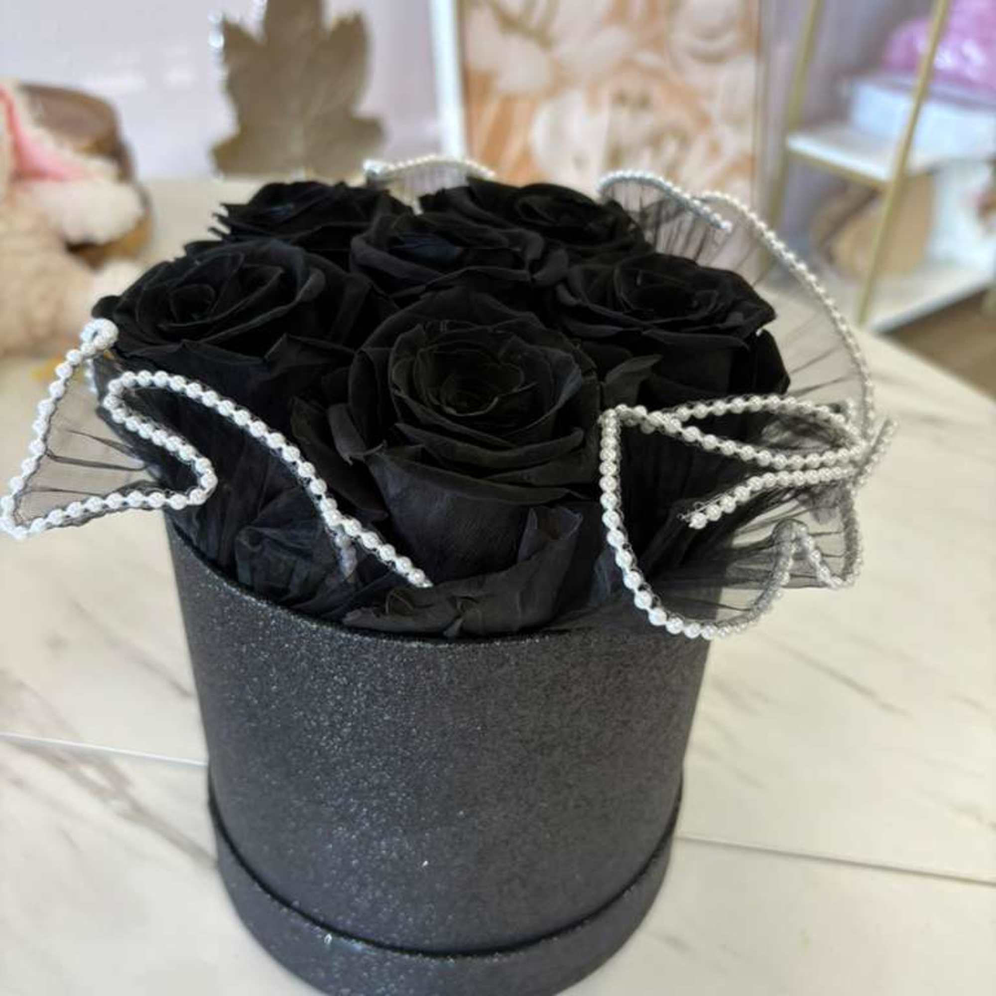 
Discover the unique beauty of our black eternal roses, a symbol of