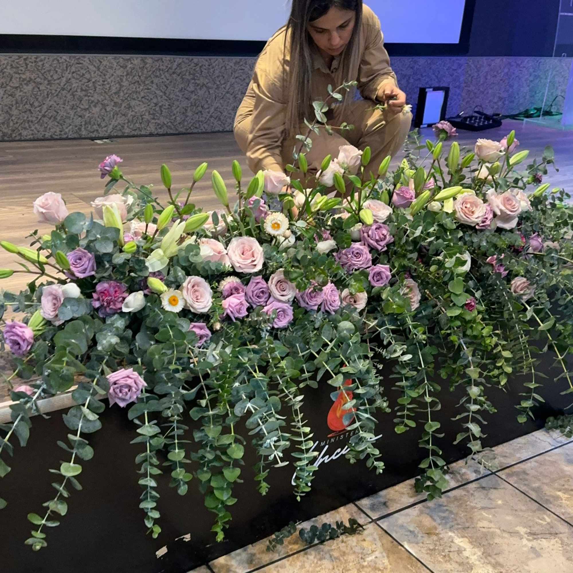 A delicate floral path enhances the beauty of the ceremony. Composed of