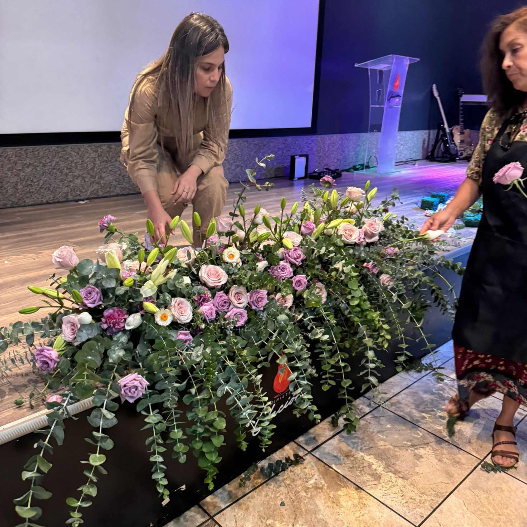 A delicate floral path enhances the beauty of the ceremony. Composed of