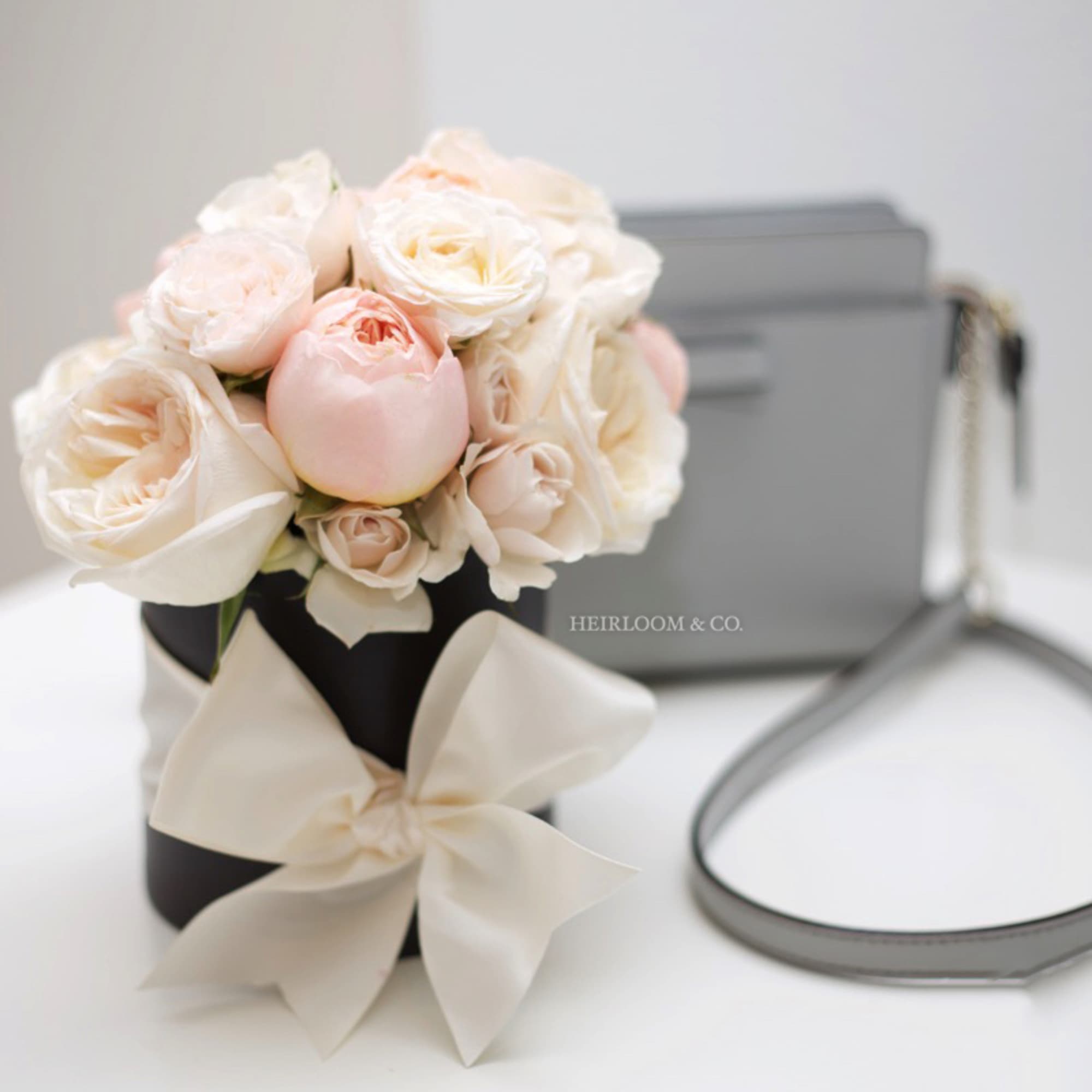 Charming, playful, and bright, this arrangement was inspired by the very gracious