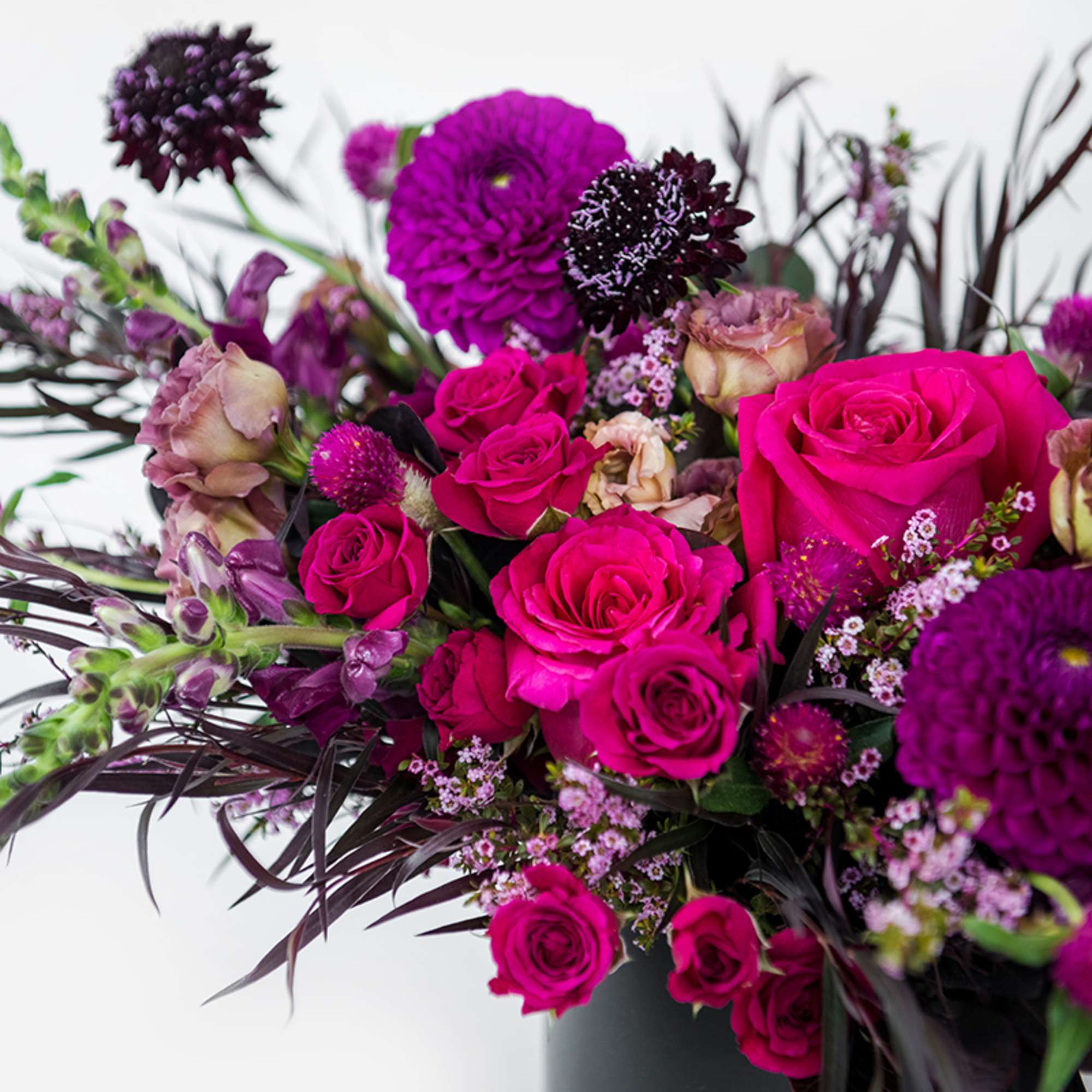 Unleash your witchy side with Wicked, a non-traditional and moody floral arrangement