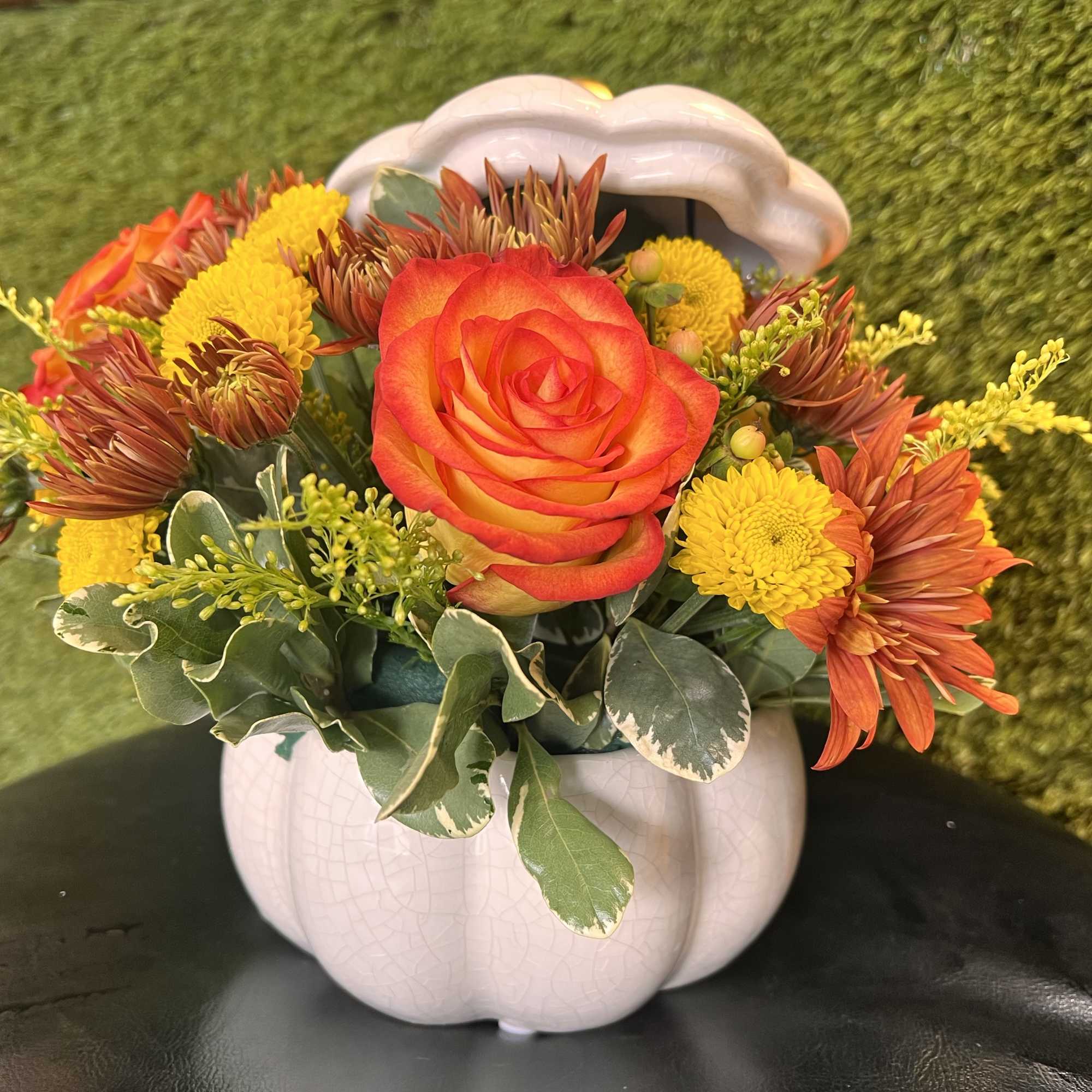 Crackle white ceramic pumpkin. (Cookie jar) with Orange Roses,
Solidago, Button Pom Yellow Crackle white ceramic pumpkin. (Cookie jar) with Orange Roses,
Solidago, Button Pom Yellow