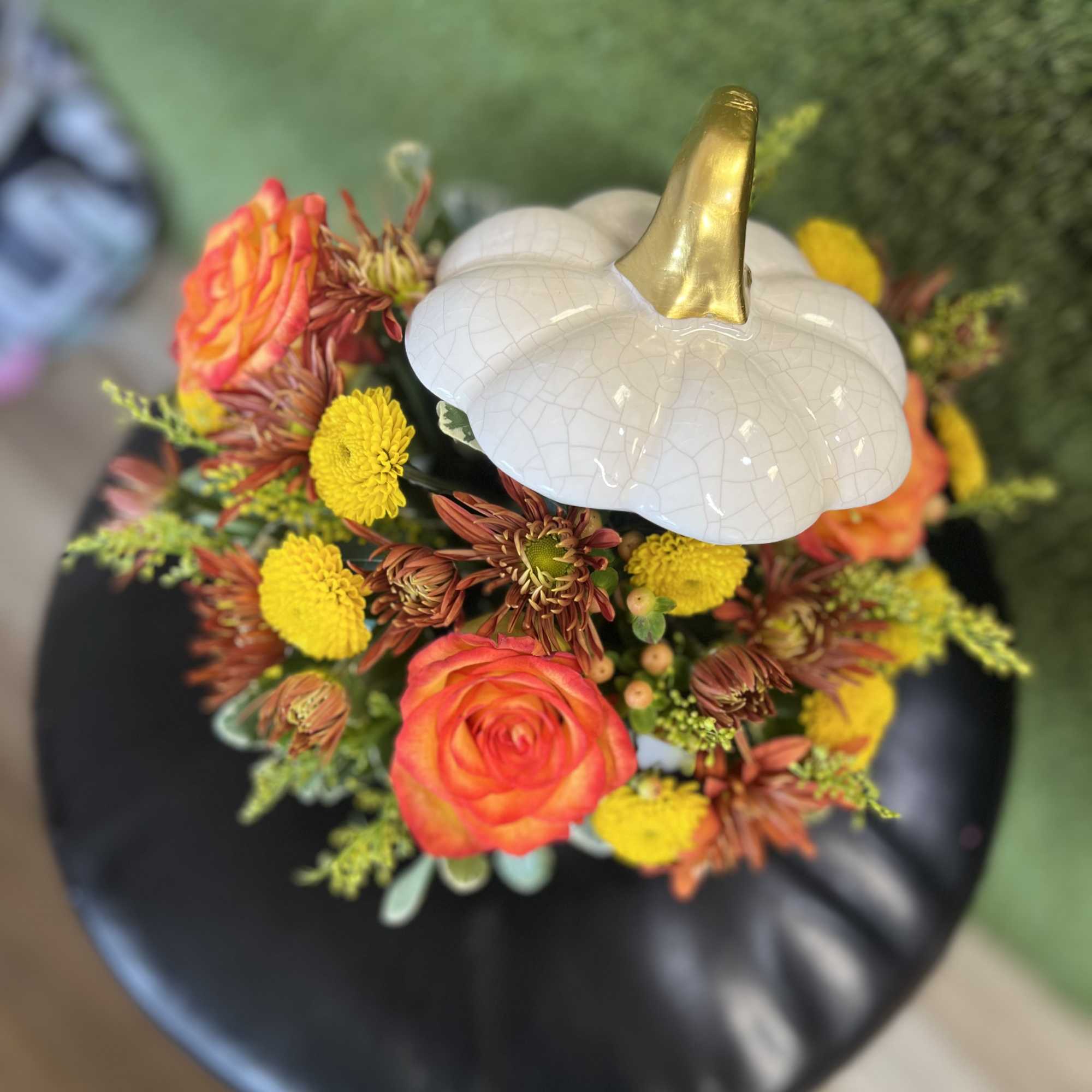 Crackle white ceramic pumpkin. (Cookie jar) with Orange Roses,
Solidago, Button Pom Yellow Crackle white ceramic pumpkin. (Cookie jar) with Orange Roses,
Solidago, Button Pom Yellow
