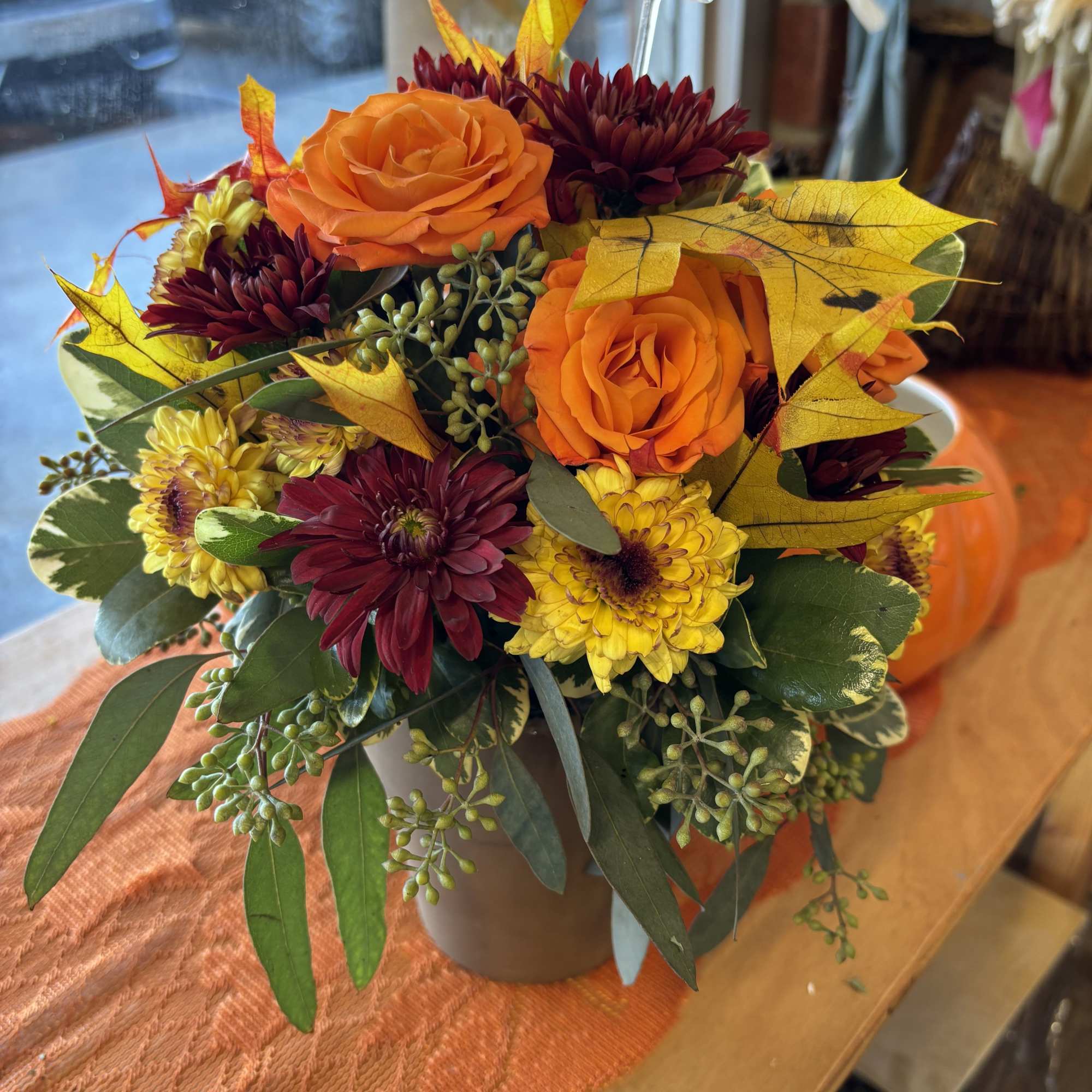 Autumnal colors of yellow, bronze and green - set off by fiery Autumnal colors of yellow, bronze and green - set off by fiery