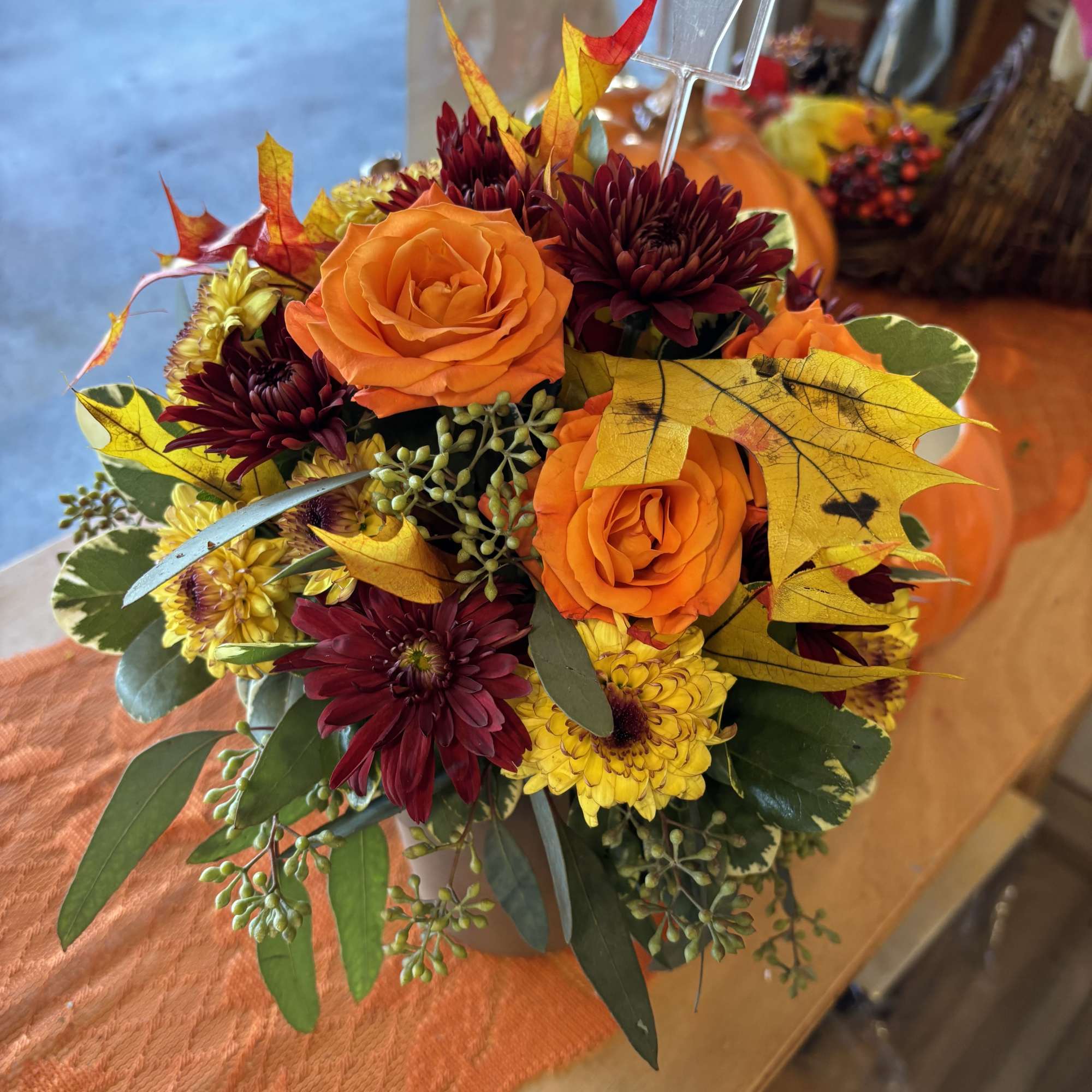 Autumnal colors of yellow, bronze and green - set off by fiery Autumnal colors of yellow, bronze and green - set off by fiery